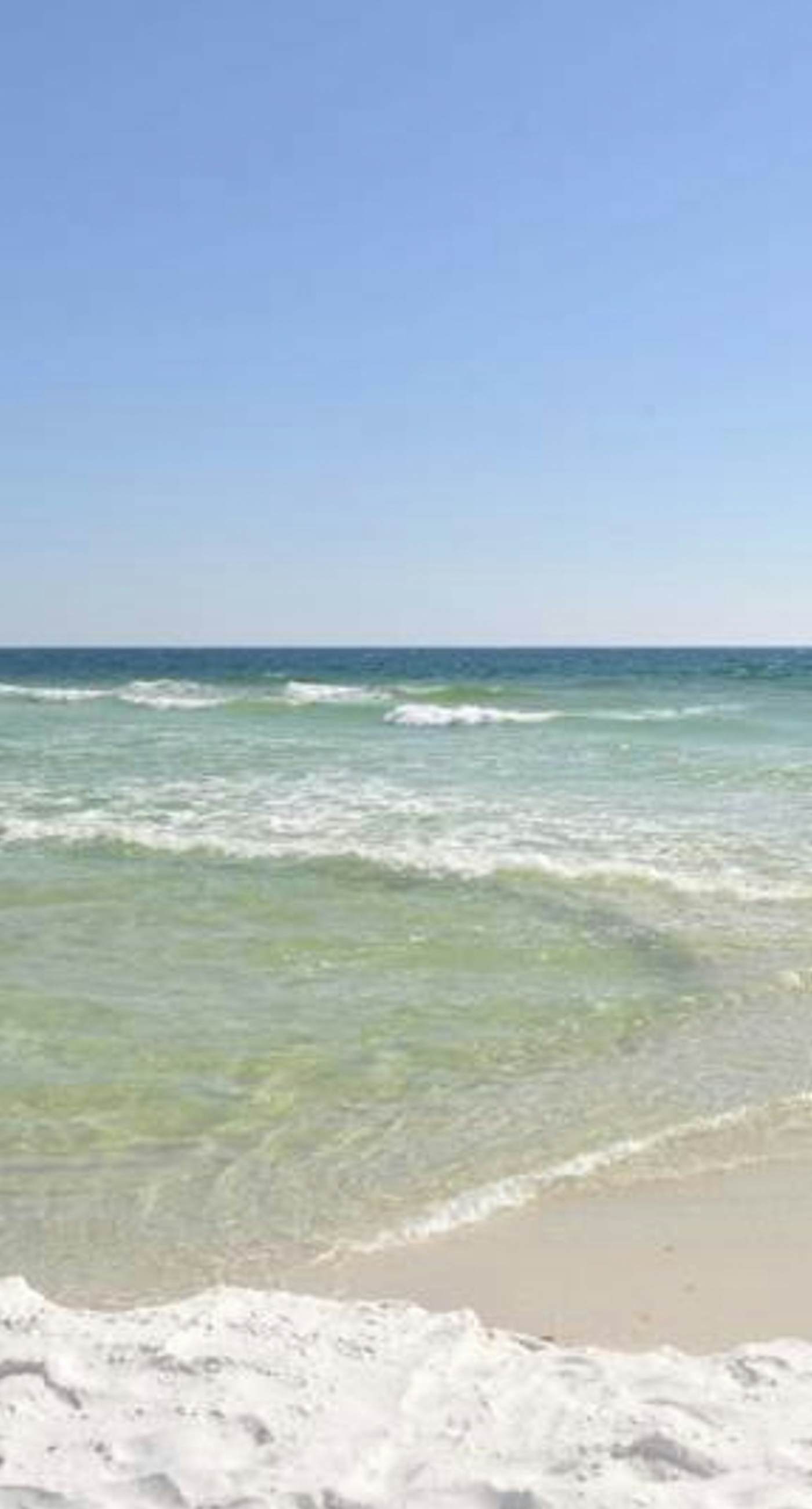 2nd Floor Comfortable bay view Condo, Beach setup & bicycles included