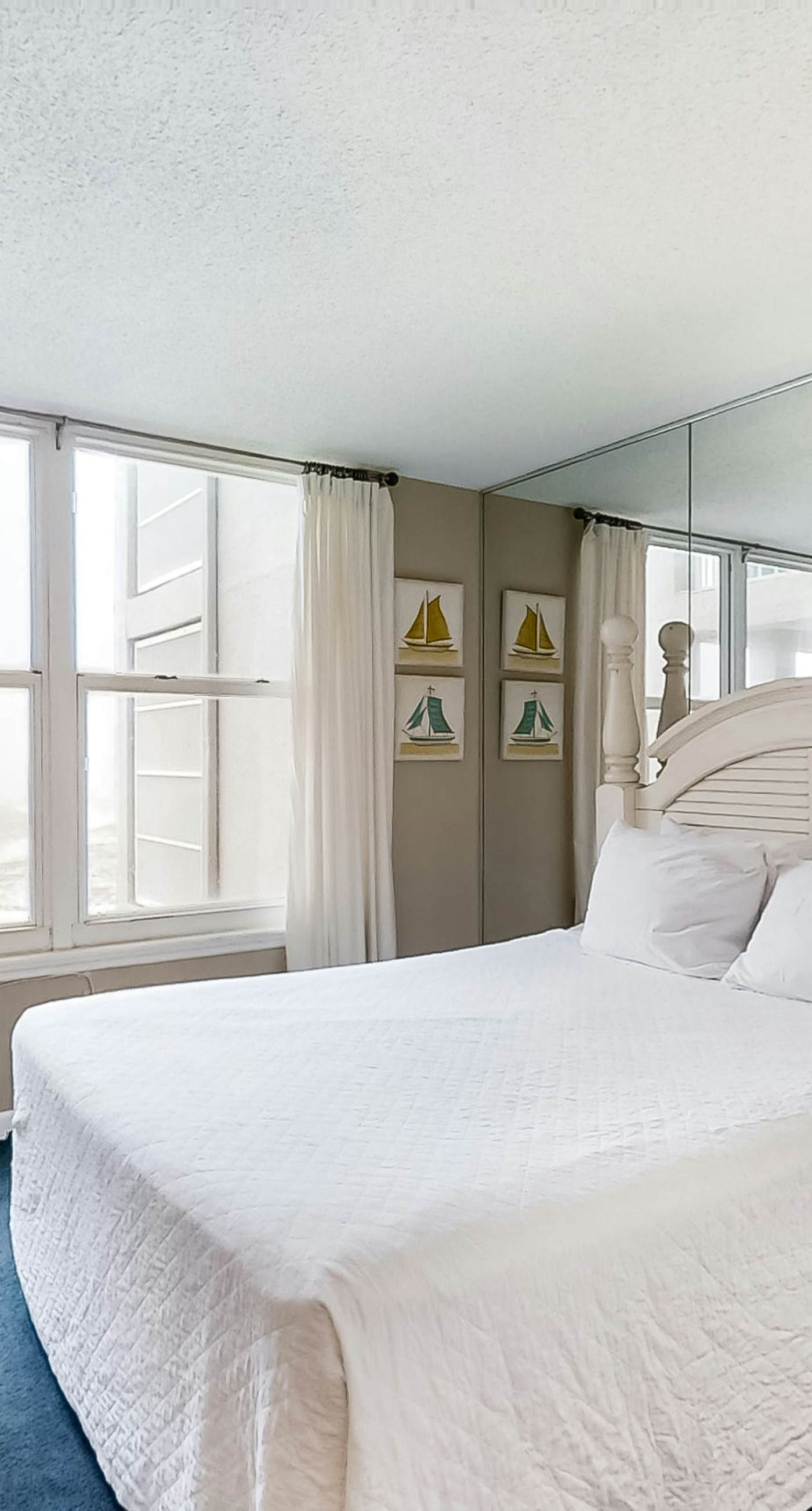 4th Floor Airy, open bay view condo, beach setup & close to everything