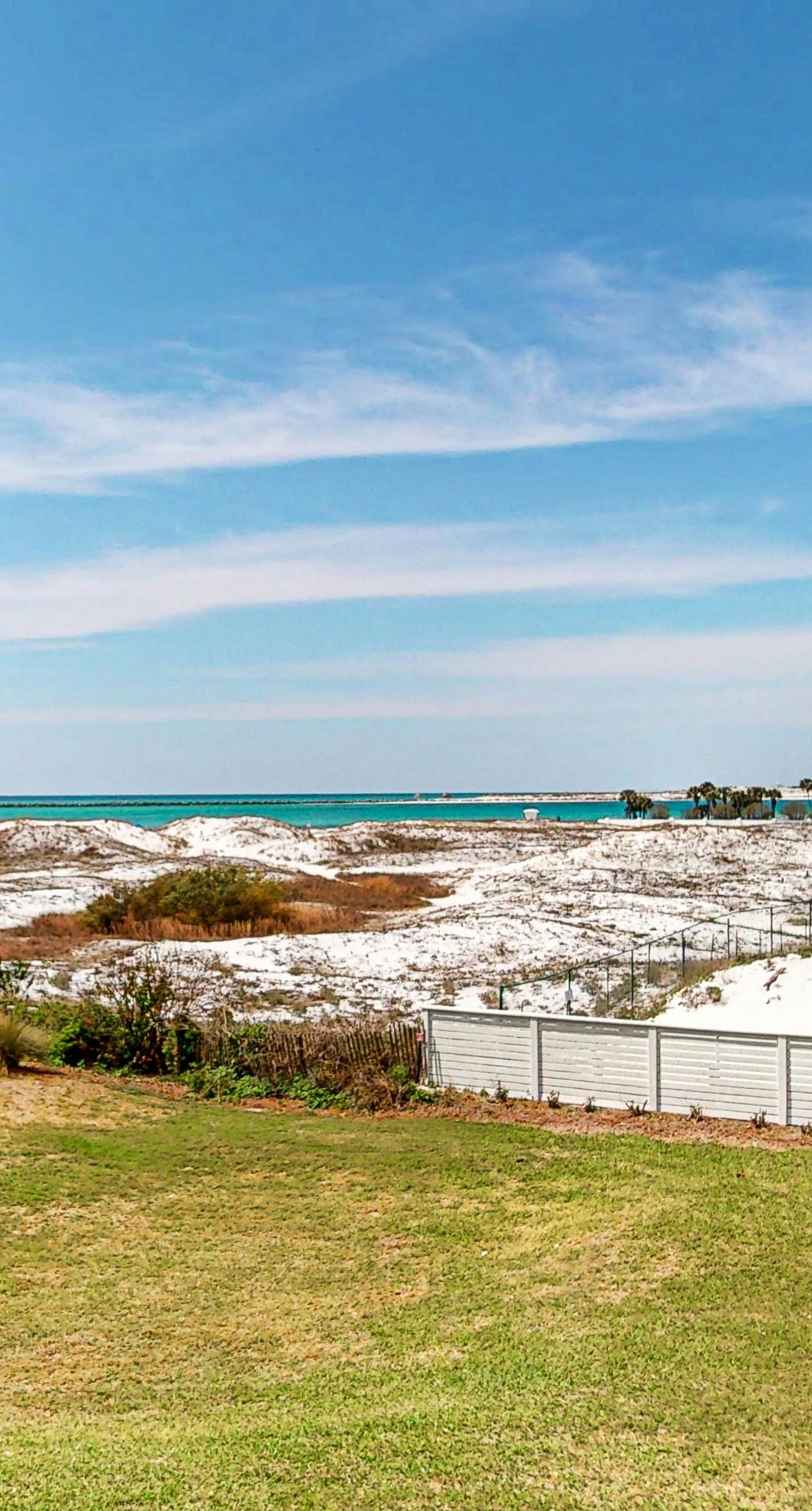 4th Floor Airy, open bay view condo, beach setup & close to everything