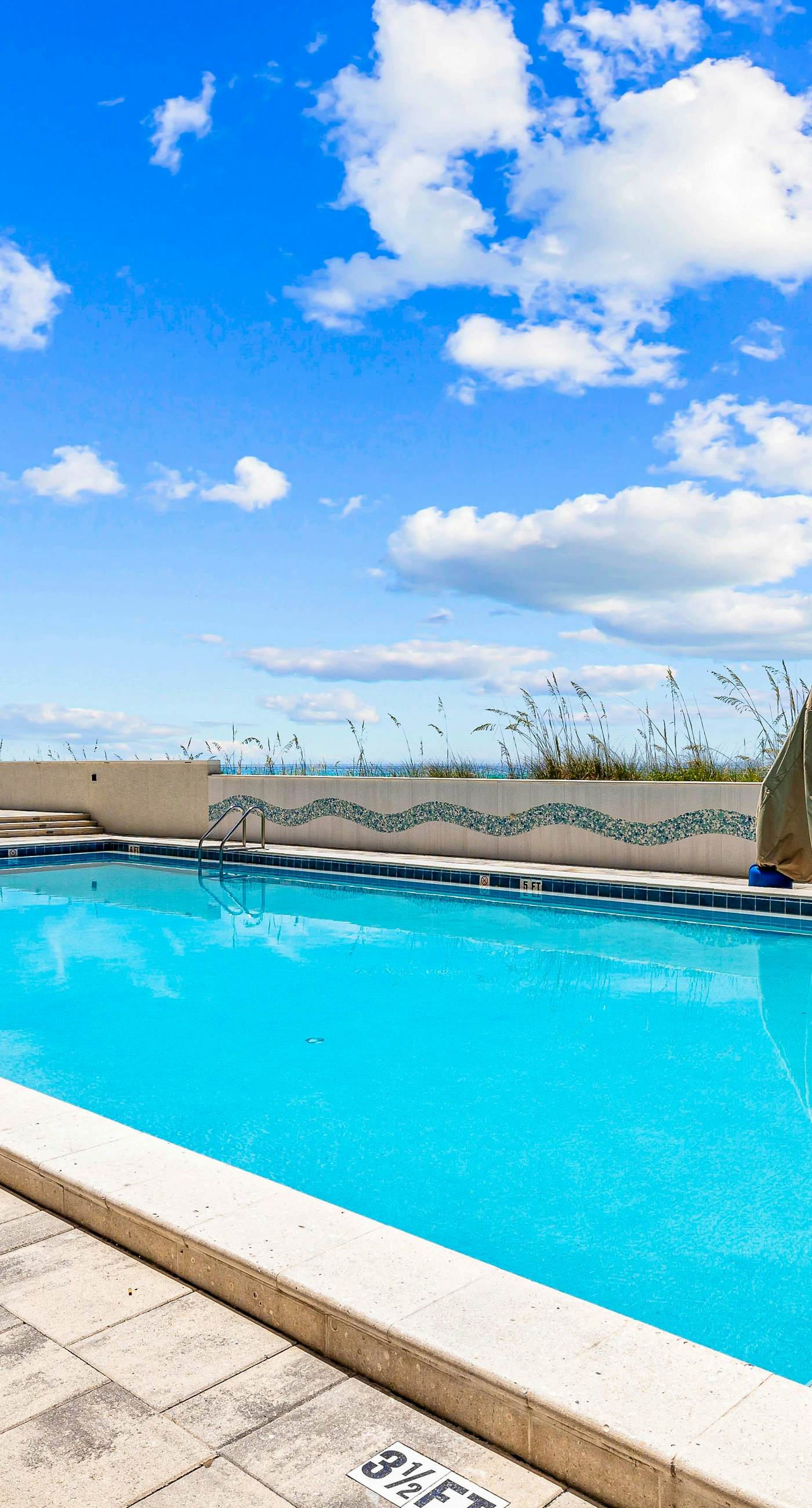 Ocean-view condo at SunDestin with pool, hot tub, sauna, and walkable locale