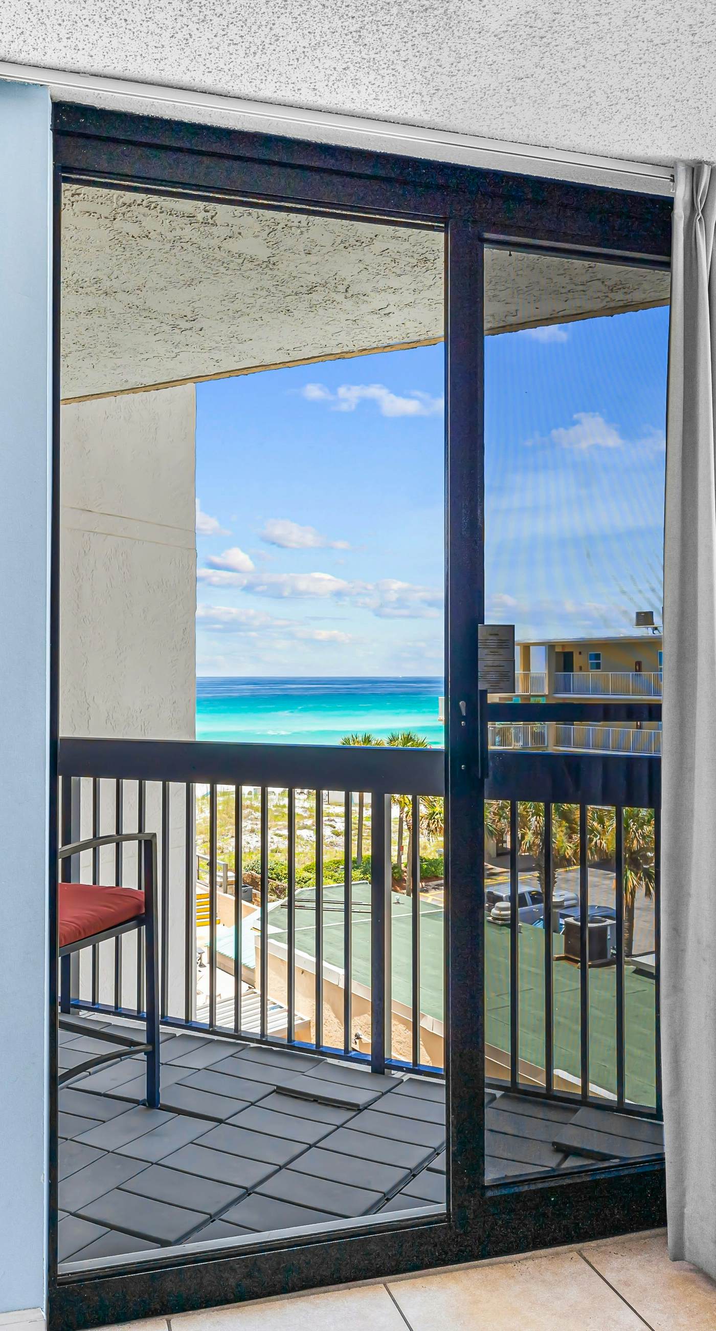 Ocean-view condo at SunDestin with pool, hot tub, sauna, and walkable locale