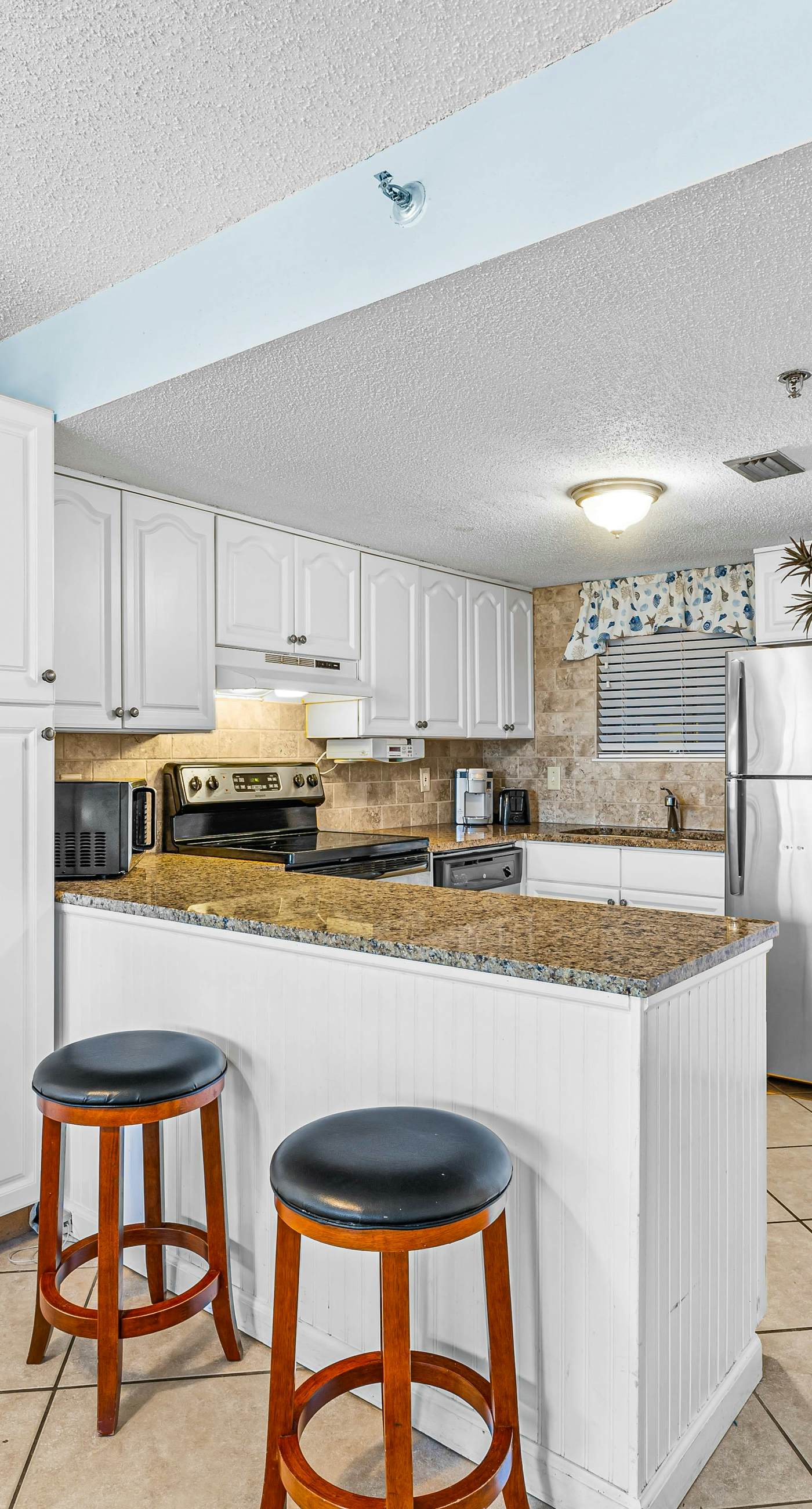 Ocean-view condo at SunDestin with pool, hot tub, sauna, and walkable locale