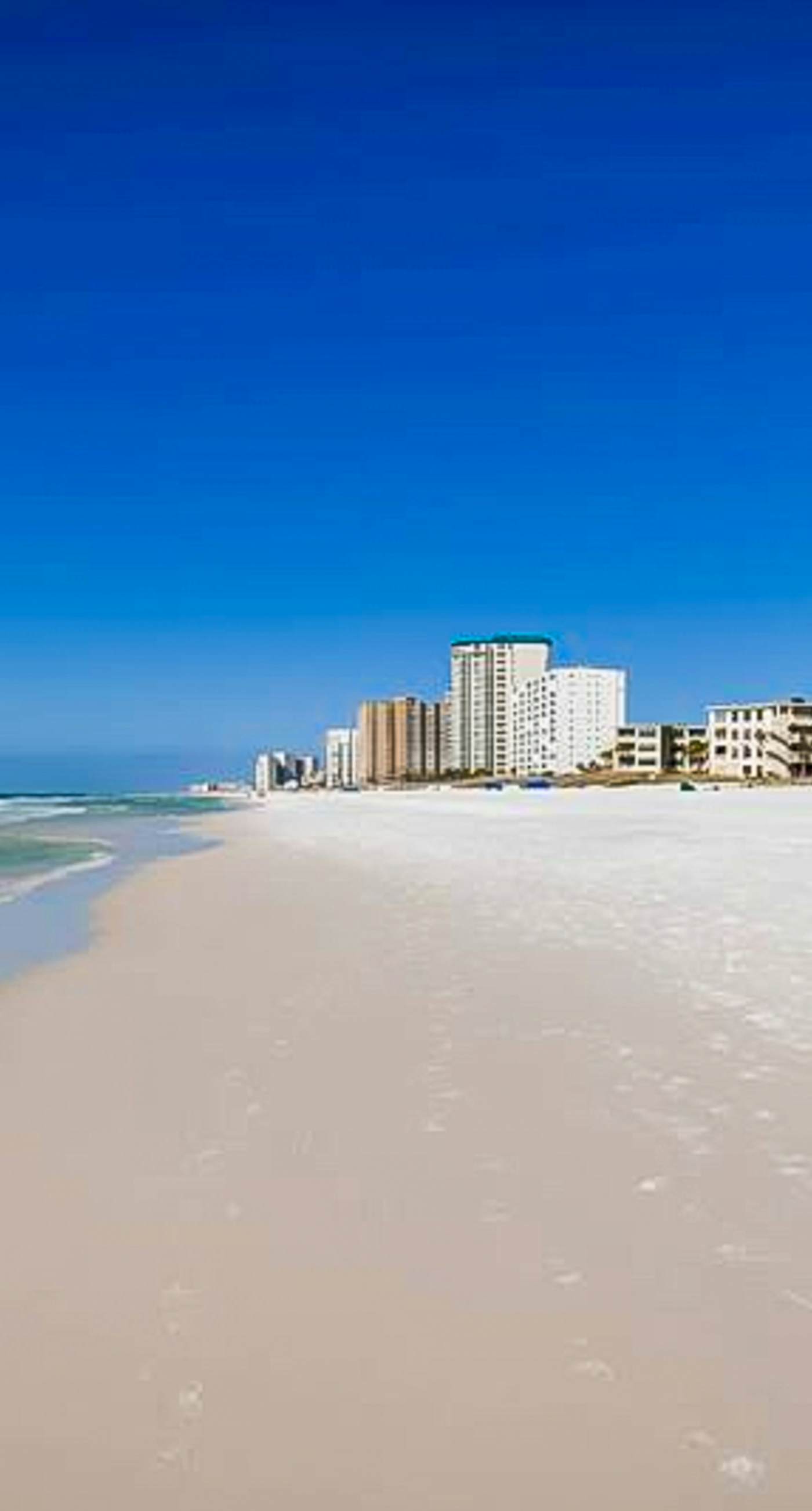 Spacious oceanfront condo with pool on-site, ocean view, WiFi & central AC