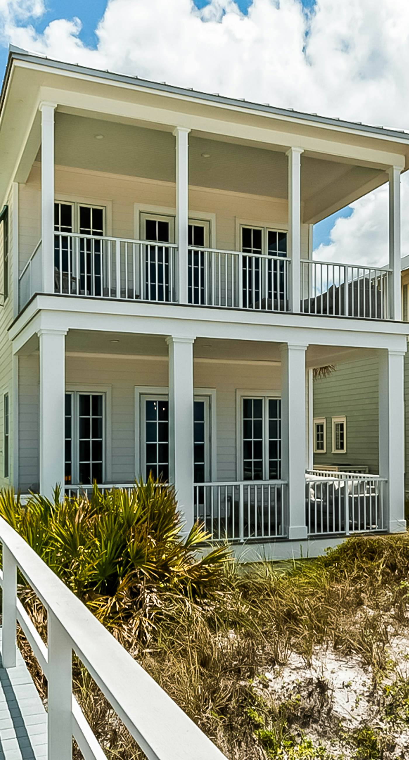 Spacious Gulf-front getaway with beach access, balcony views, a pool, & more