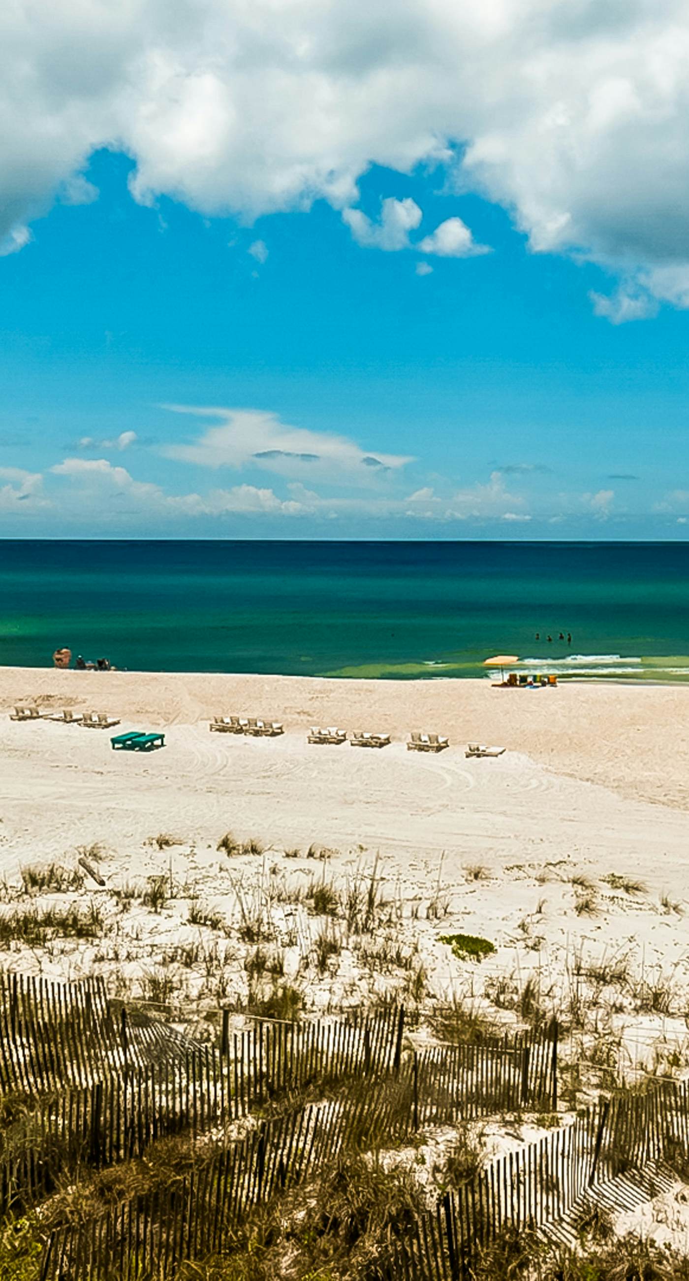 Spacious Gulf-front getaway with beach access, balcony views, a pool, & more