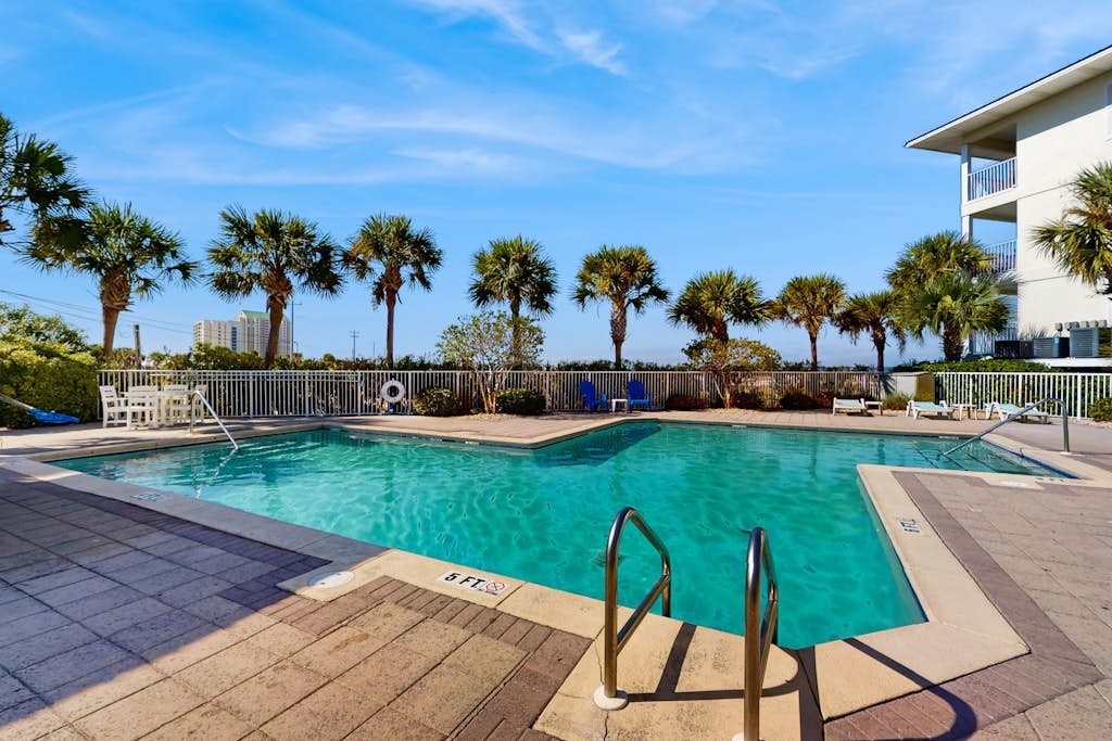 Cozy coastal condo with shared pool and easy beach access