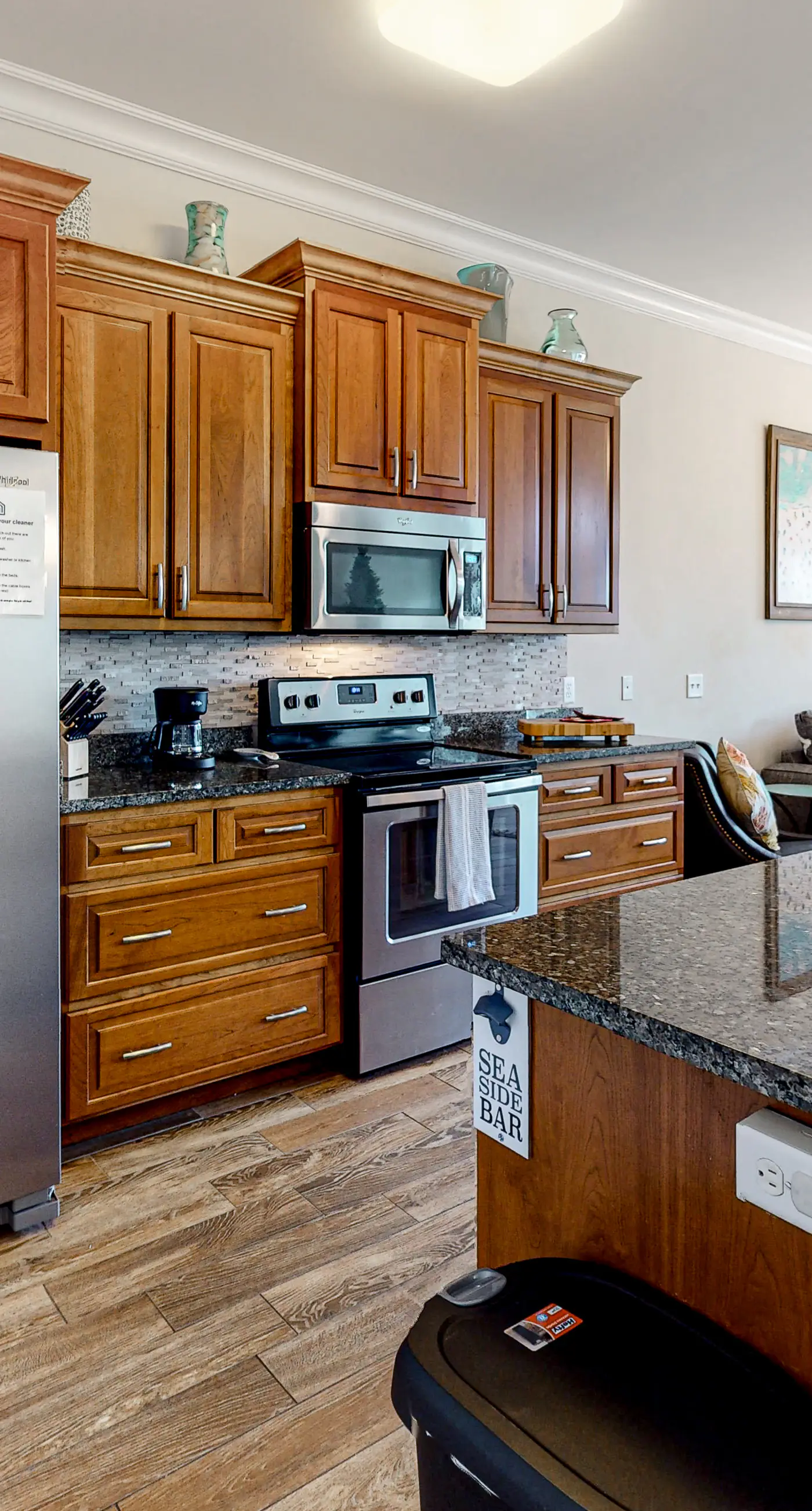 Dog-friendly beach house with balcony, fenced yard, & AC - walk to beach
