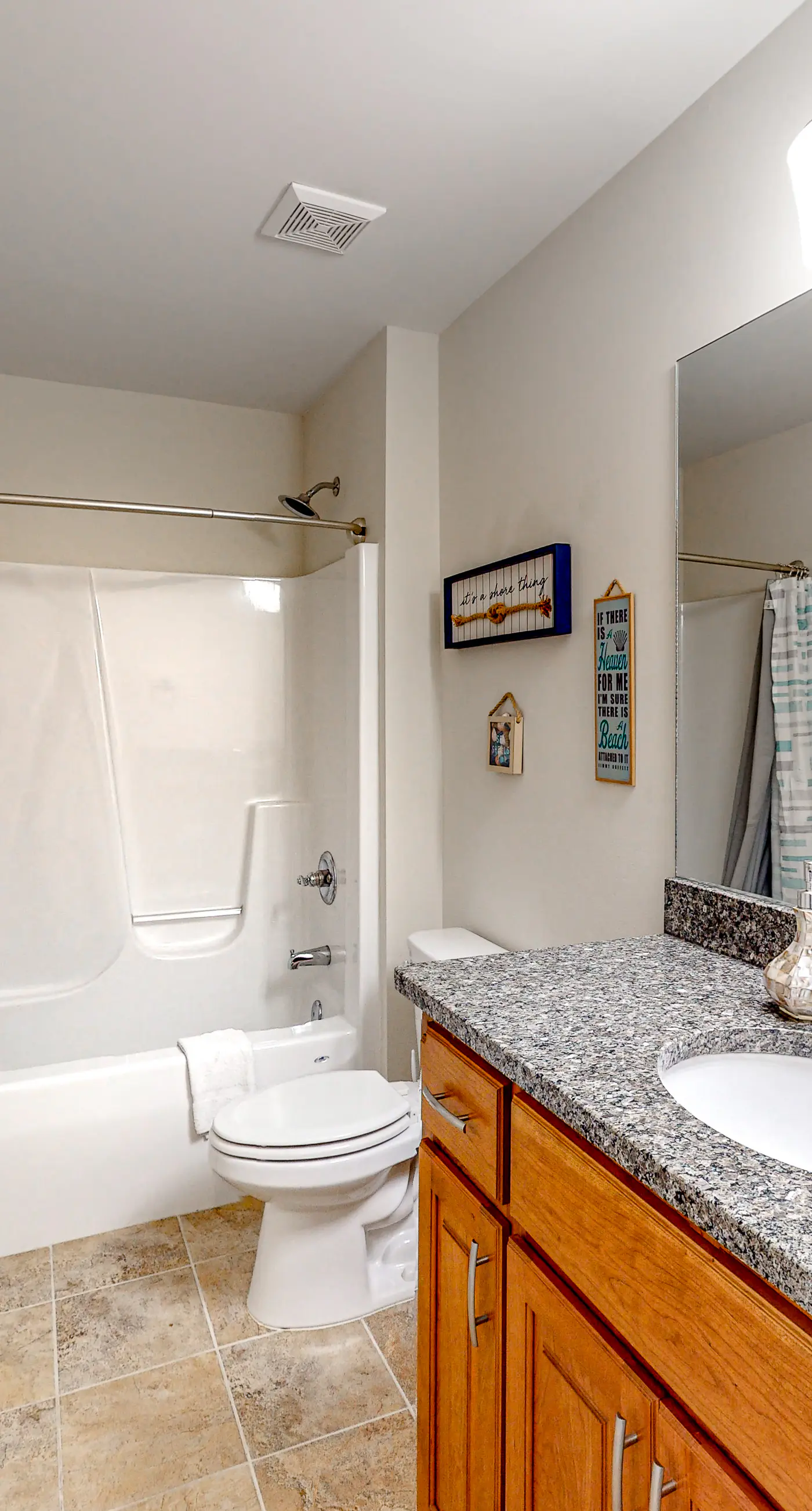 Dog-friendly beach house with balcony, fenced yard, & AC - walk to beach