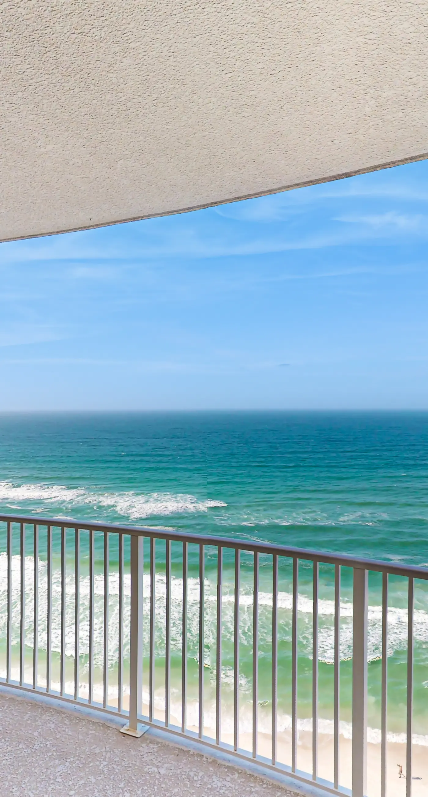 Spacious beachfront condo with full kitchen, shared pool and beach access!