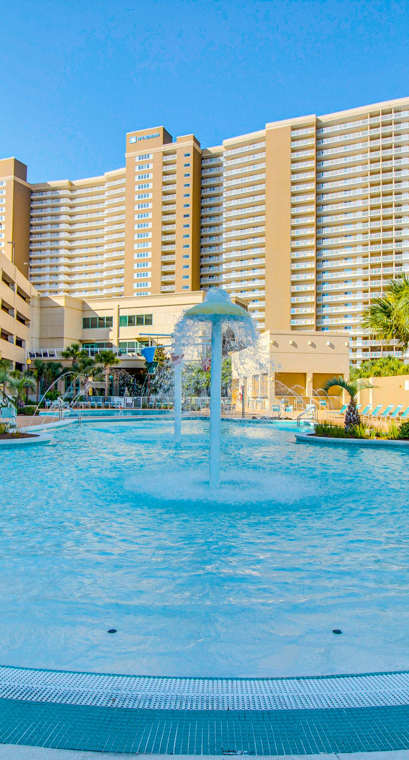 Beachfront resort condo with gulf views, pools,splash pad, hot tub, & gym