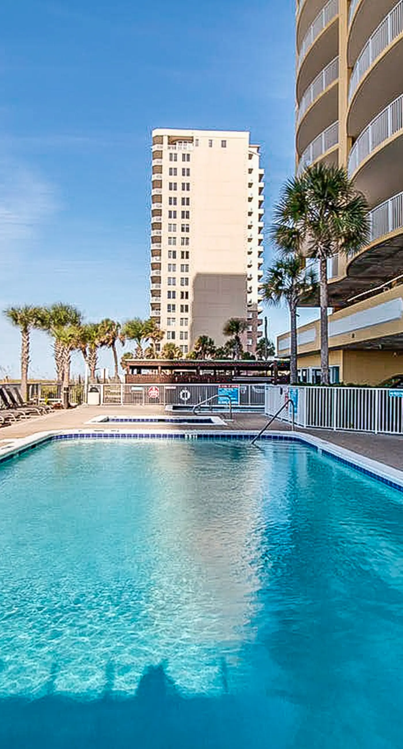Exotic Emerald Coast condo with private deck, gulf view, pool & hot tub