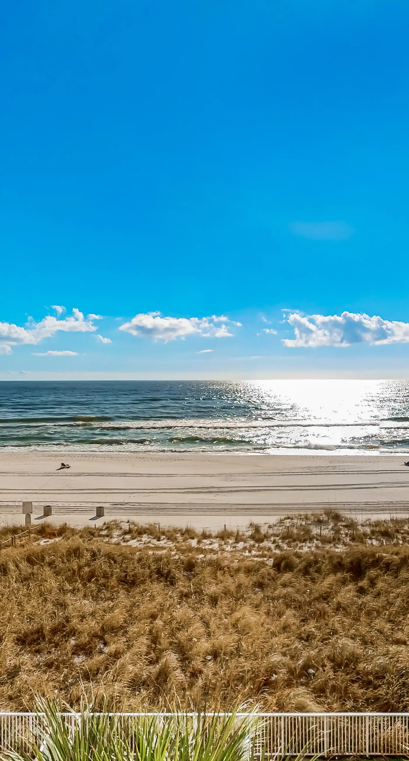 Exotic Emerald Coast condo with private deck, gulf view, pool & hot tub