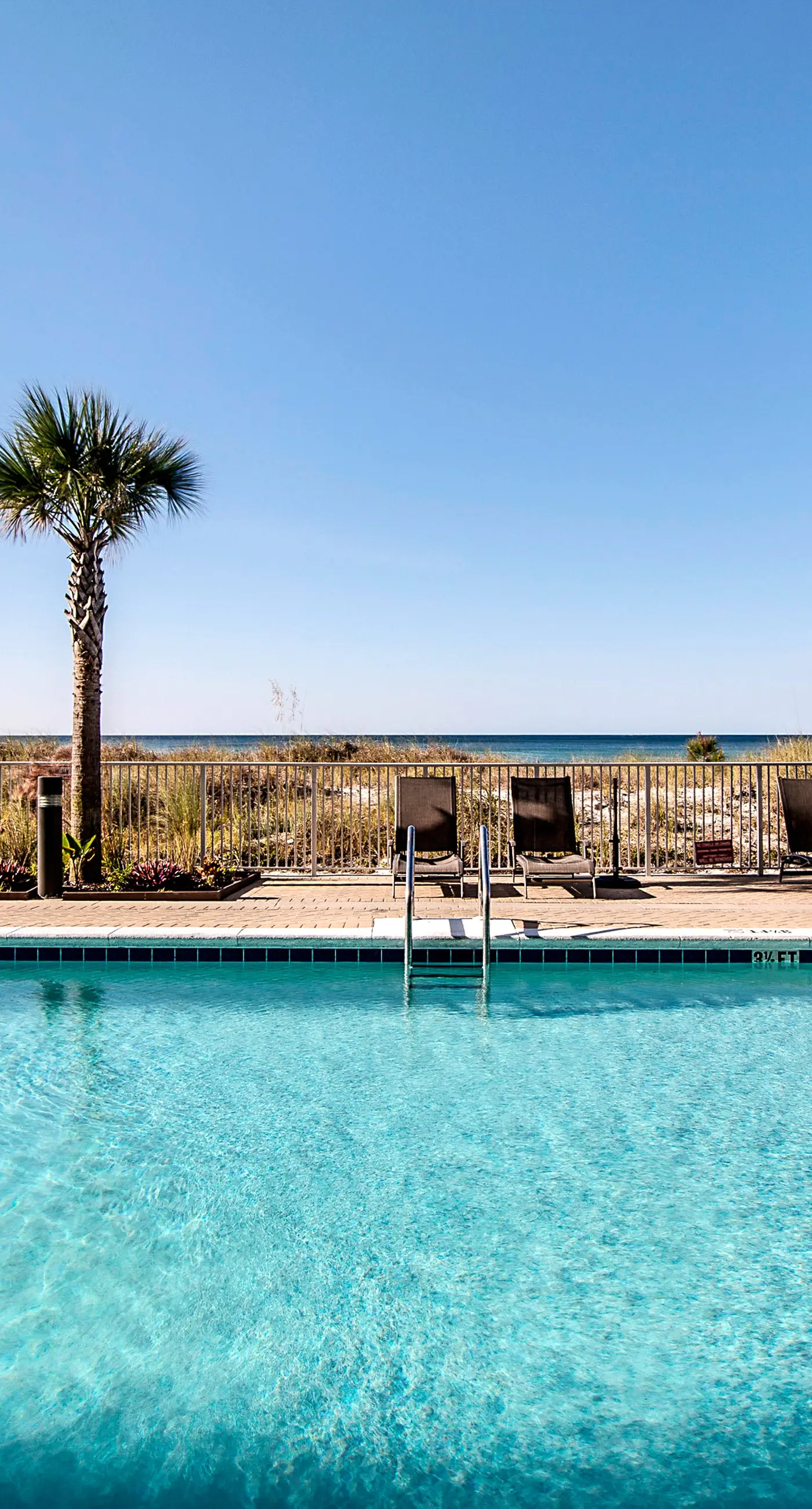 Exotic Emerald Coast condo with private deck, gulf view, pool & hot tub