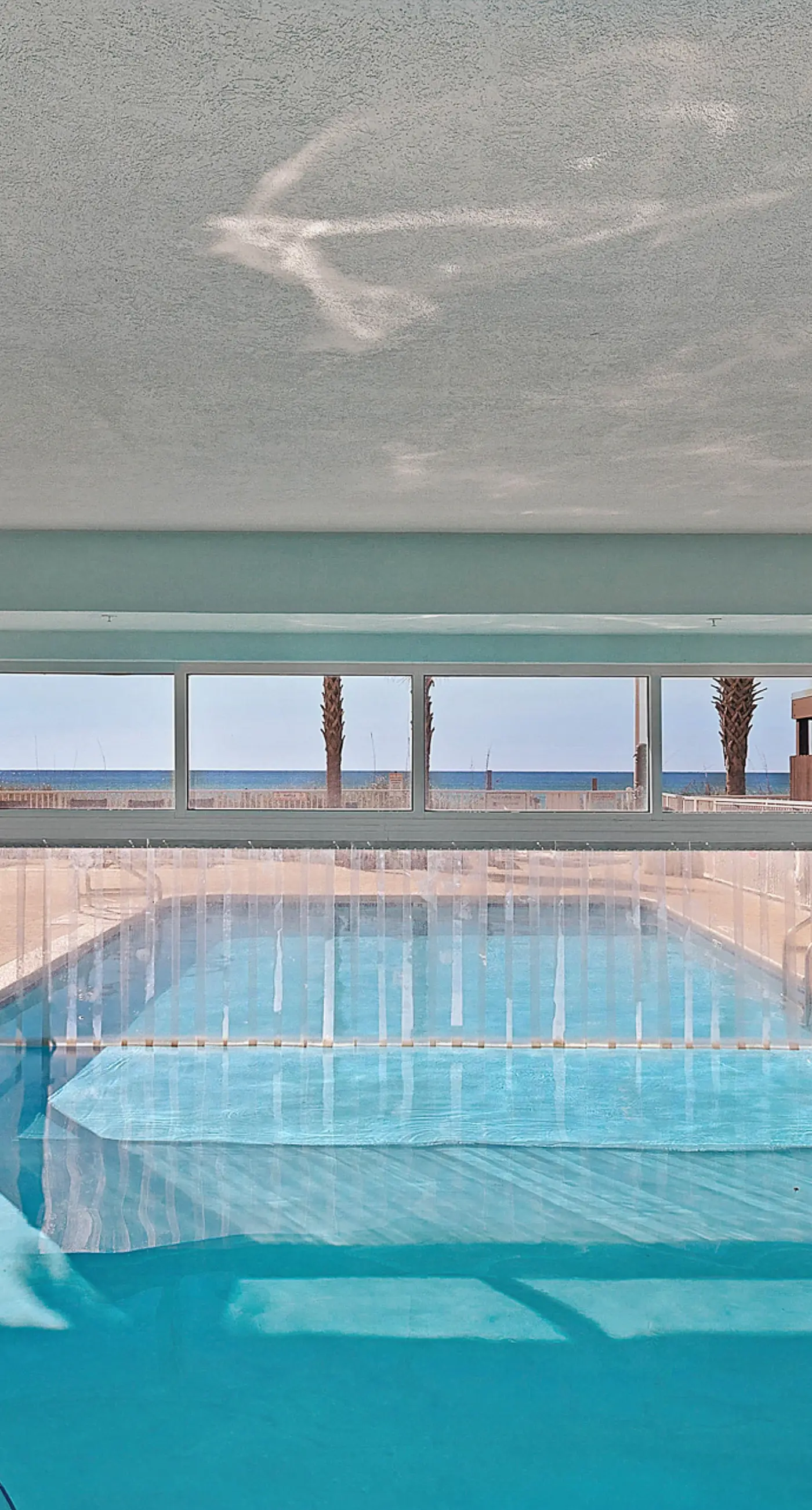 Exotic Emerald Coast condo with private deck, gulf view, pool & hot tub