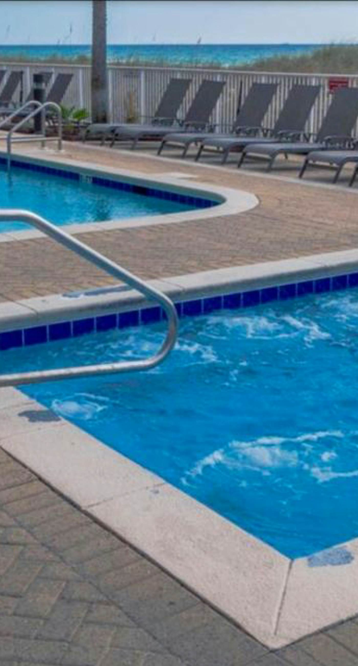 Oceanfront condo with epic gulf view, shared pool & hot tub, free WiFi, & W/D