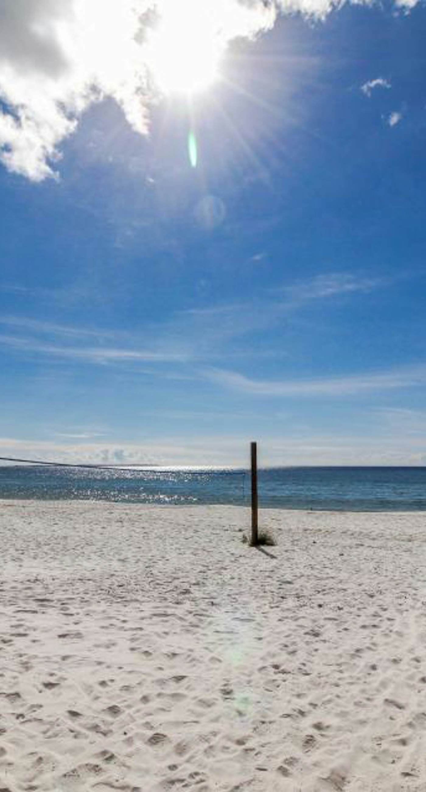 Oceanfront condo with epic gulf view, shared pool & hot tub, free WiFi, & W/D