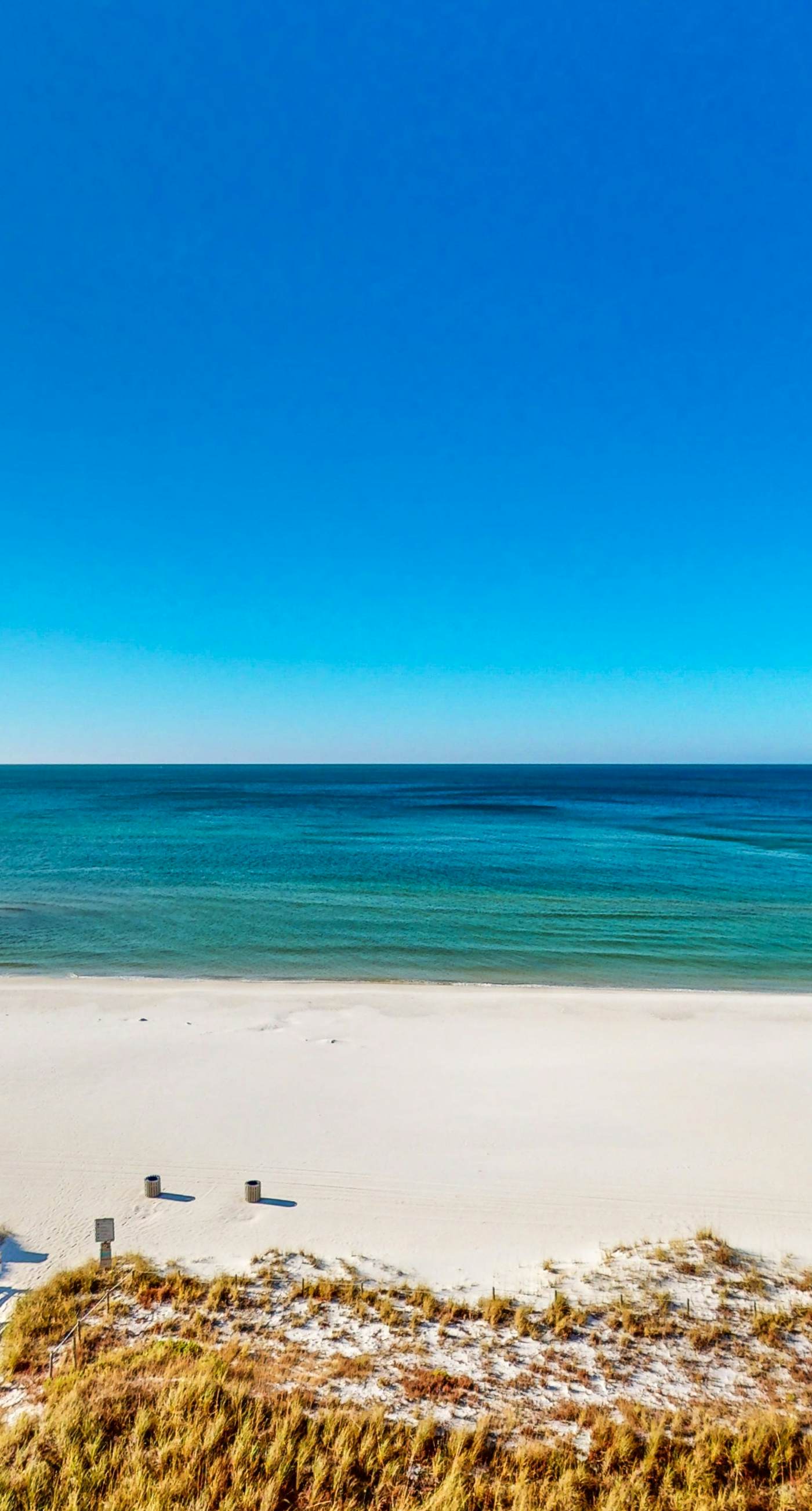 Waterfront condo in a resort setting w/ shared pools, hot tub, & beach access