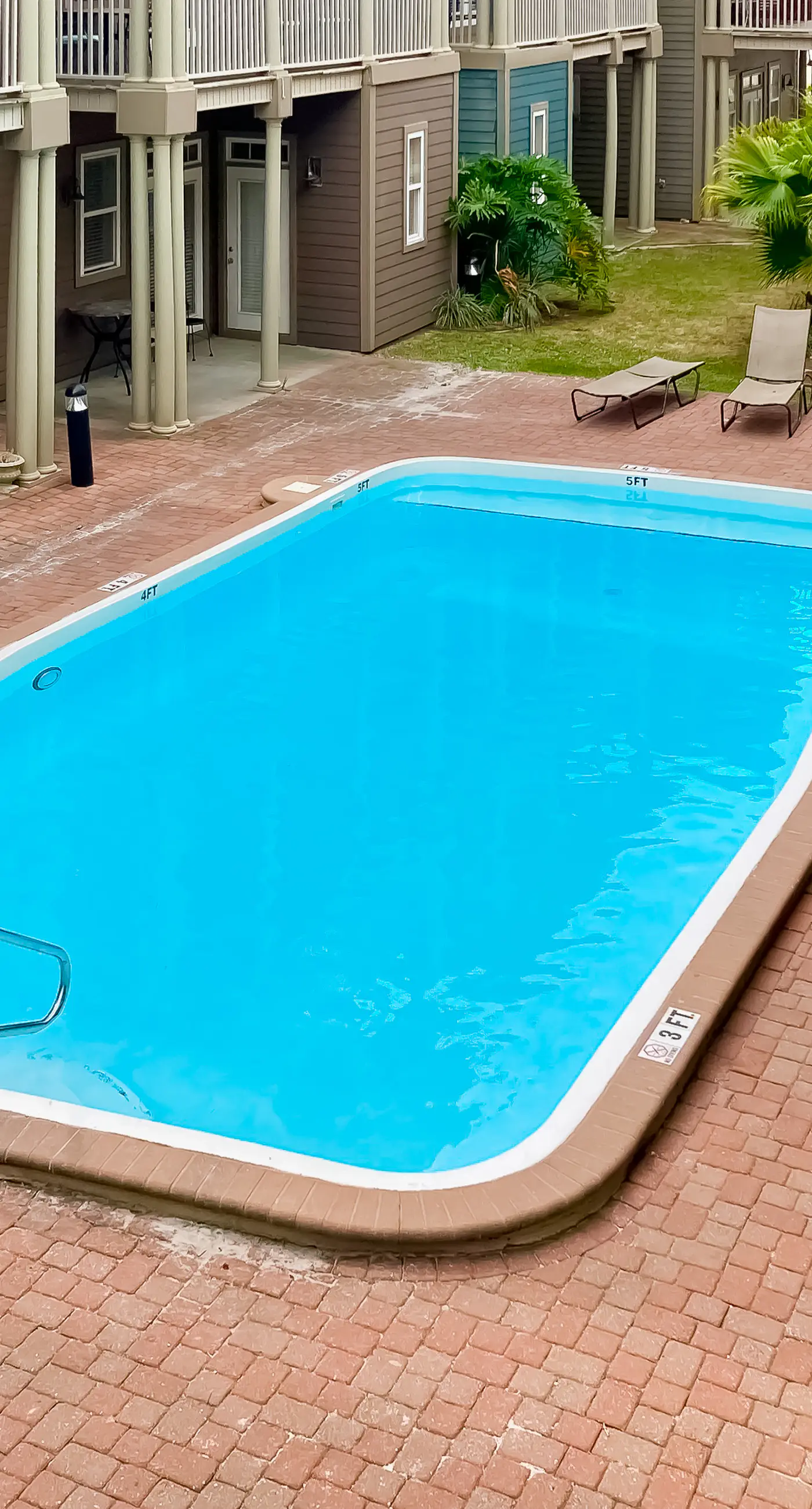 Dog-friendly home with balconies, foosball, pool access, & W&D - steps to beach