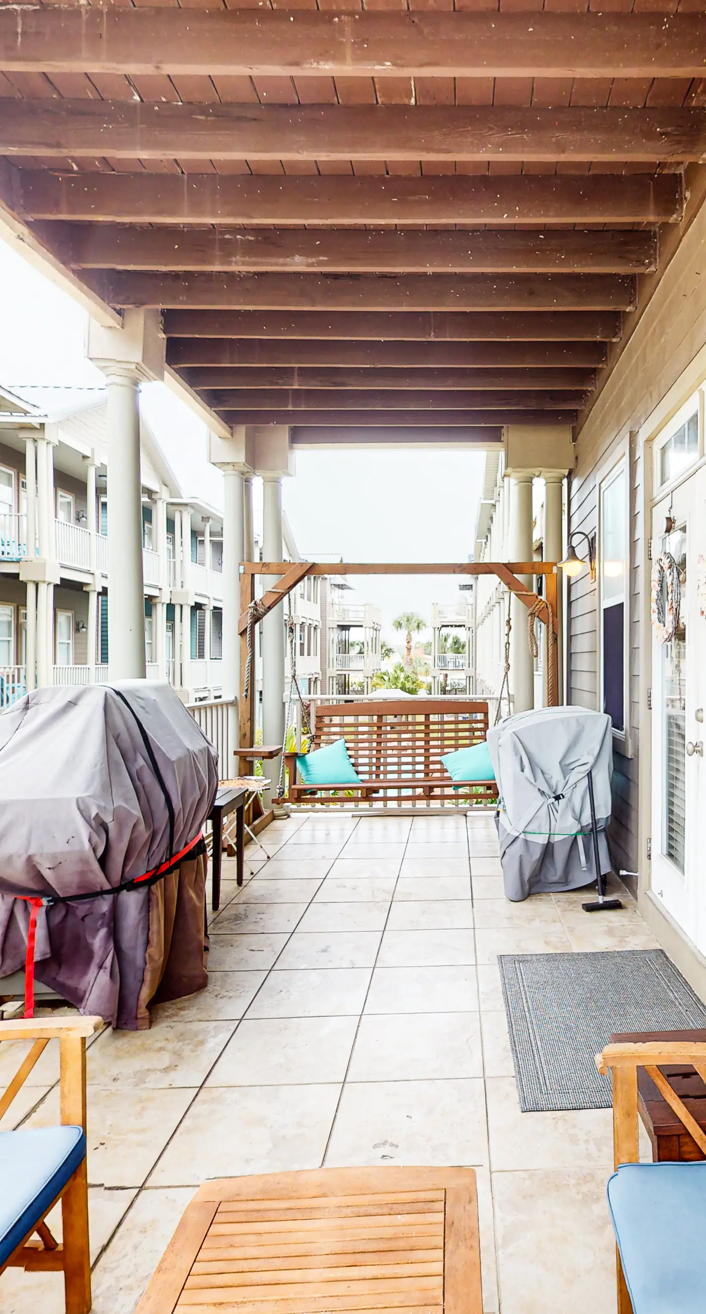 Dog-friendly home with balconies, foosball, pool access, & W&D - steps to beach