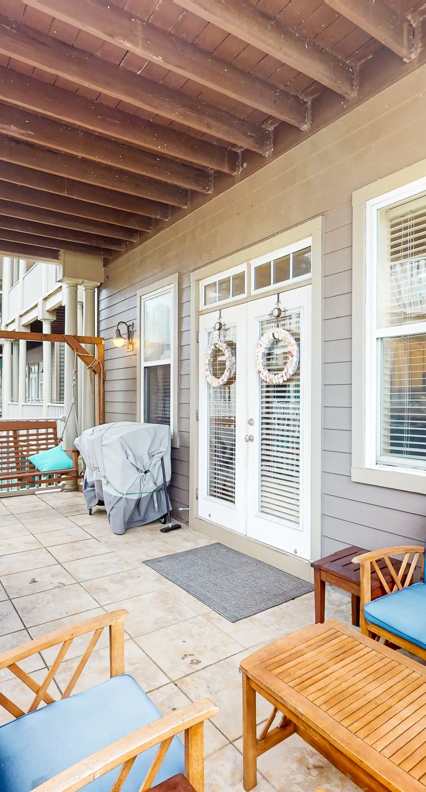 Dog-friendly home with balconies, foosball, pool access, & W&D - steps to beach