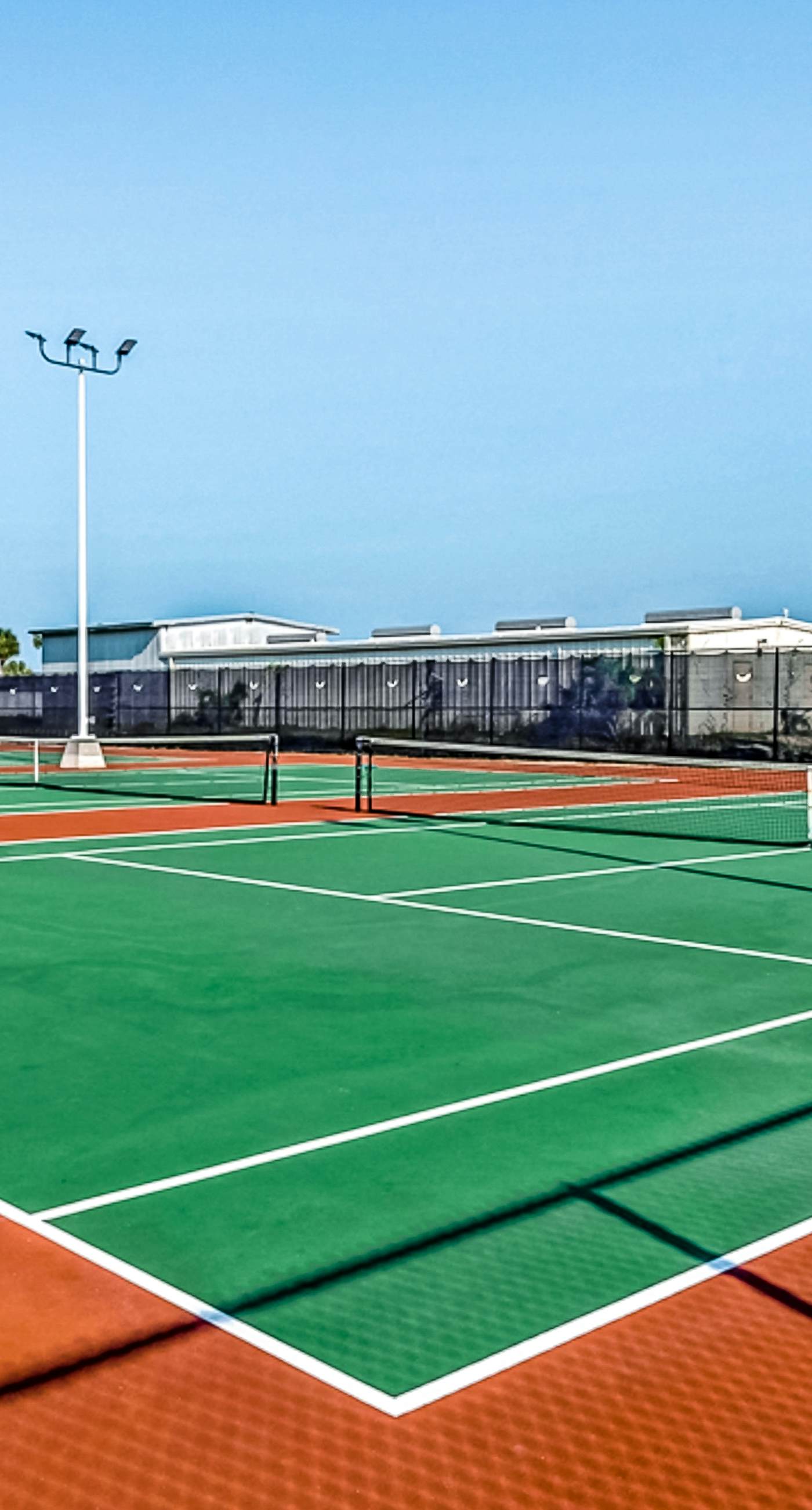 Gulf & lake view condo in beachfront resort with pool, tennis & saunas