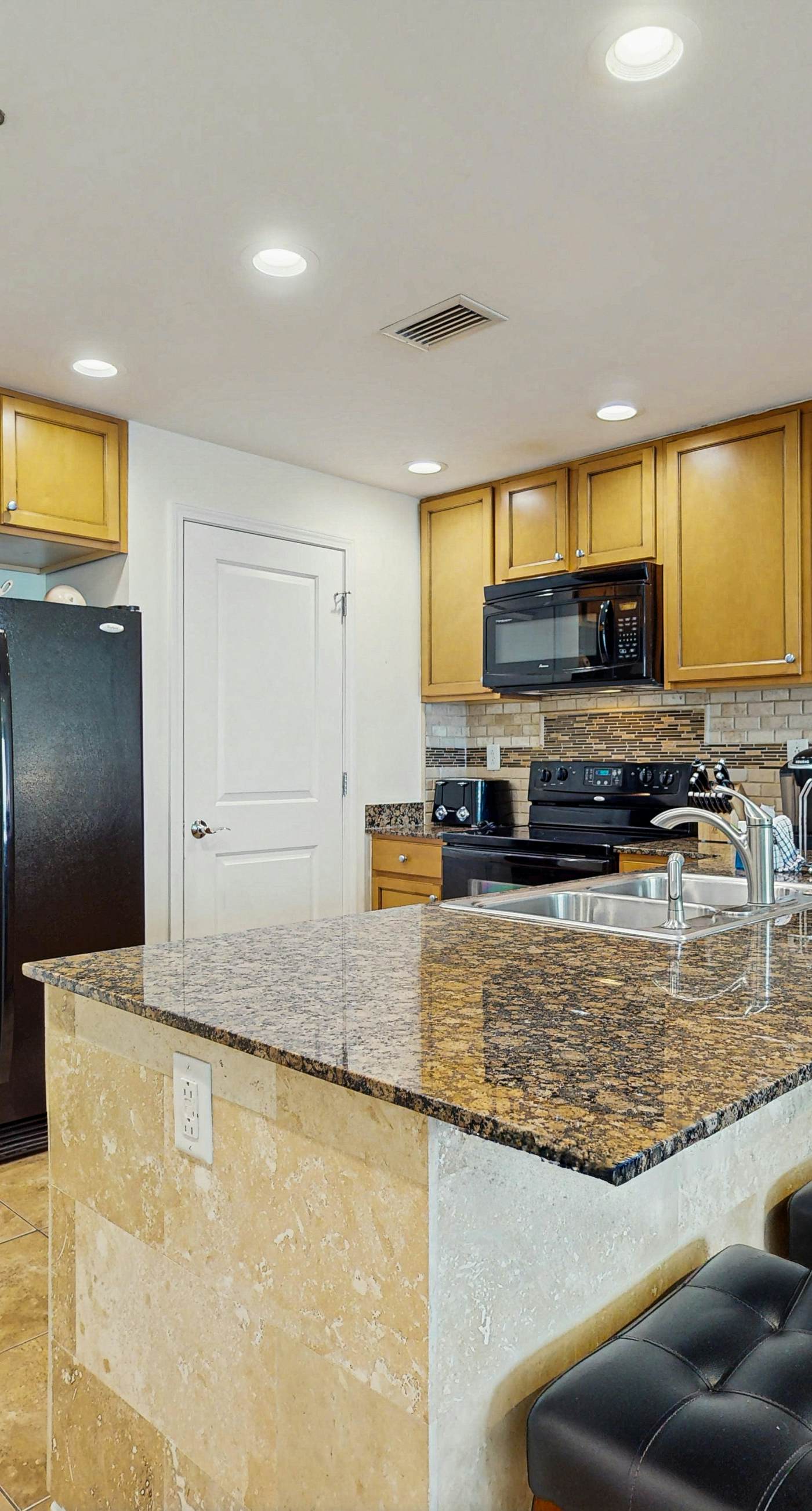 Updated beachfront retreat with hot tub, outdoor pool & balcony