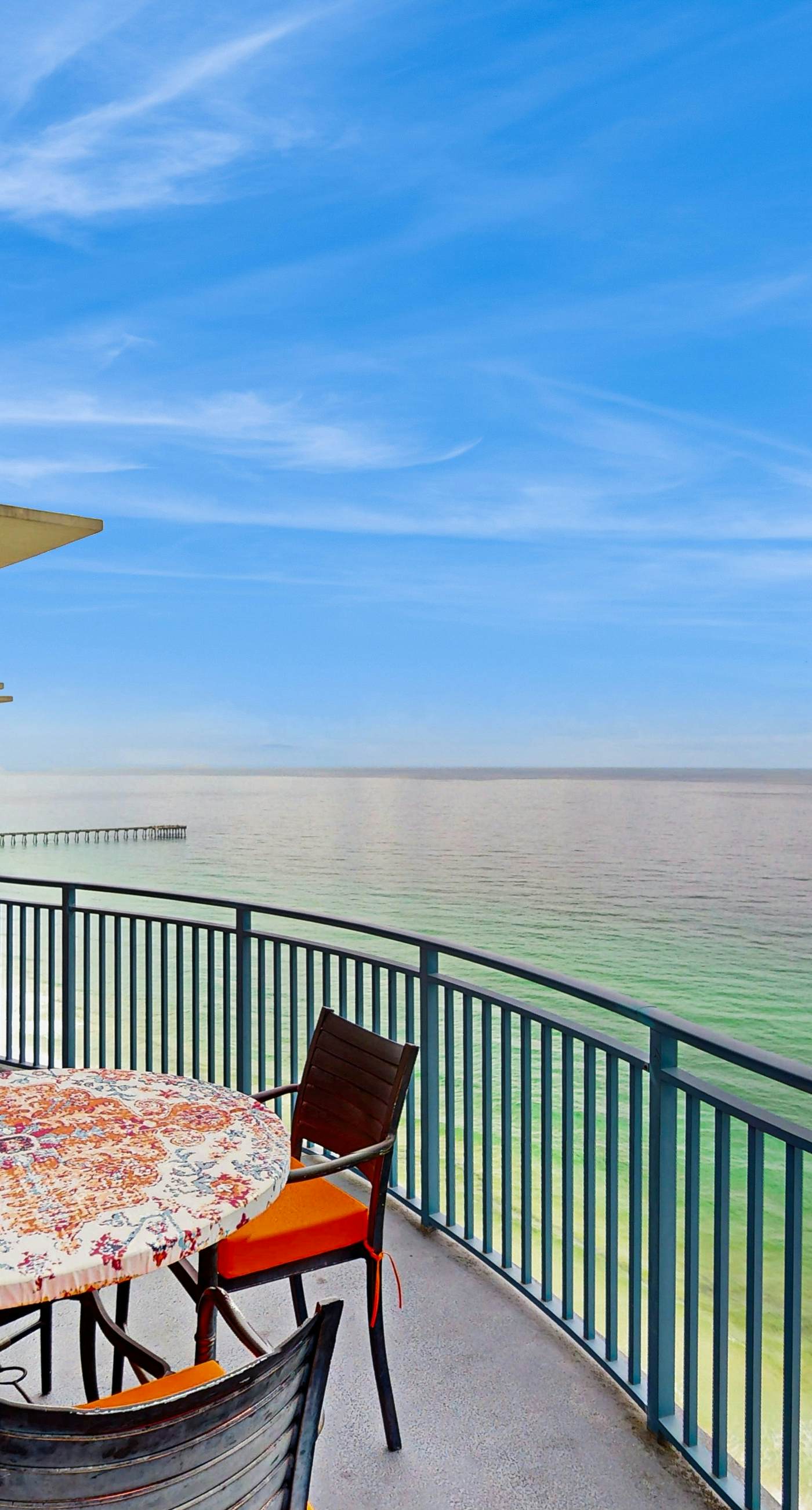 Updated beachfront retreat with hot tub, outdoor pool & balcony