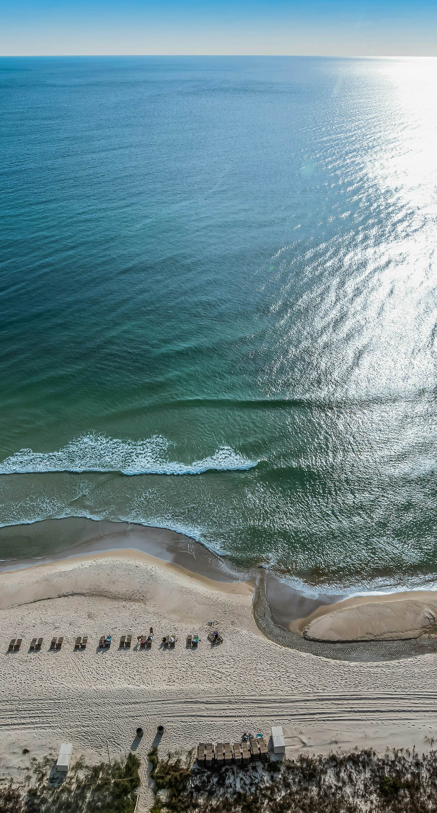 Updated beachfront retreat with hot tub, outdoor pool & balcony