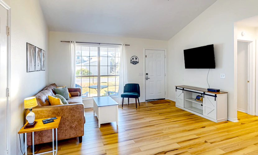 Updated home near the beach with patio, AC, & private W/D