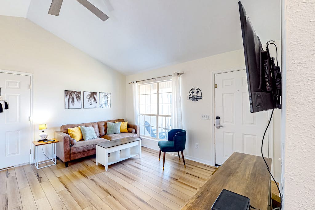 Updated home near the beach with patio, AC, & private W/D