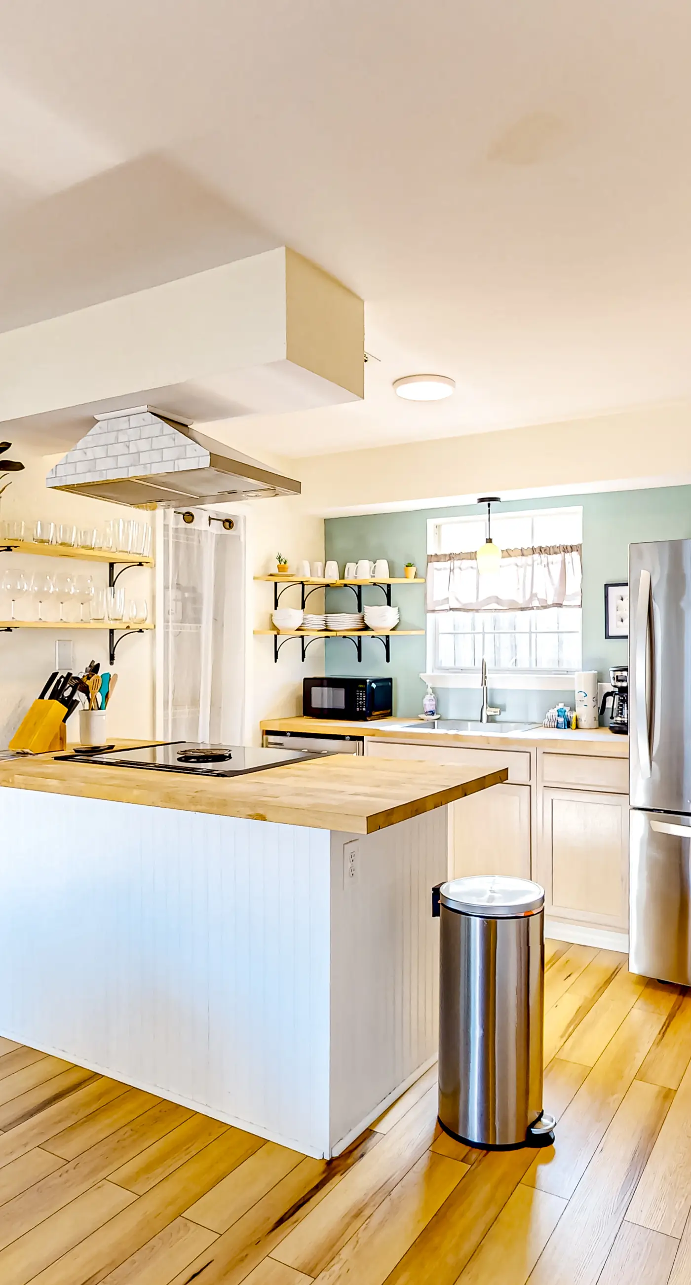 Updated home near the beach with patio, AC, & private WD