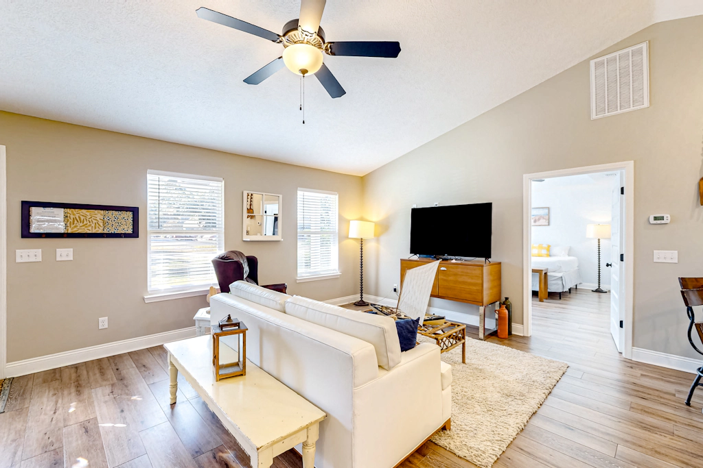 Sunlit dog-friendly Gulf retreat with patio & W/D - moments from beaches & parks