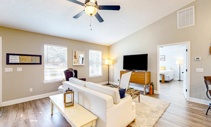 Sunlit dog-friendly Gulf retreat with patio & W/D - moments from beaches & parks