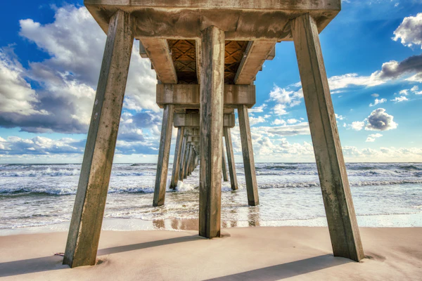 Sunlit dog-friendly Gulf retreat with patio & W/D - moments from beaches & parks