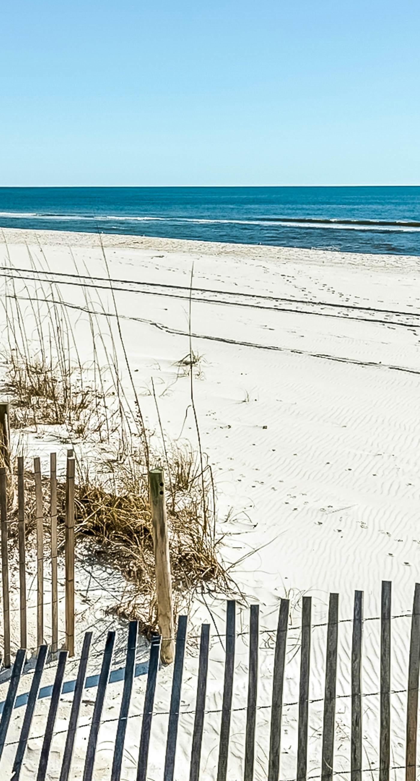 Spotless beachfront dream with views, a shared pool, & sports courts