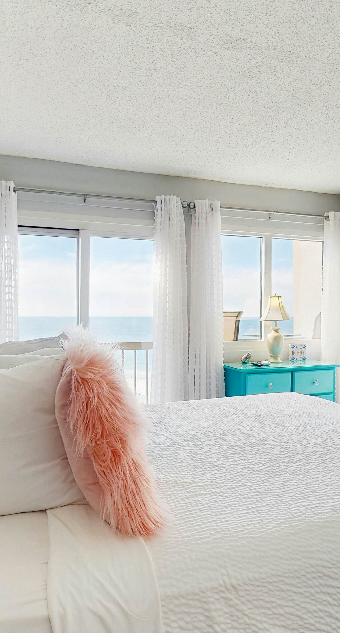 Spectacular beachfront condo with great amenities, shared pool & beach access