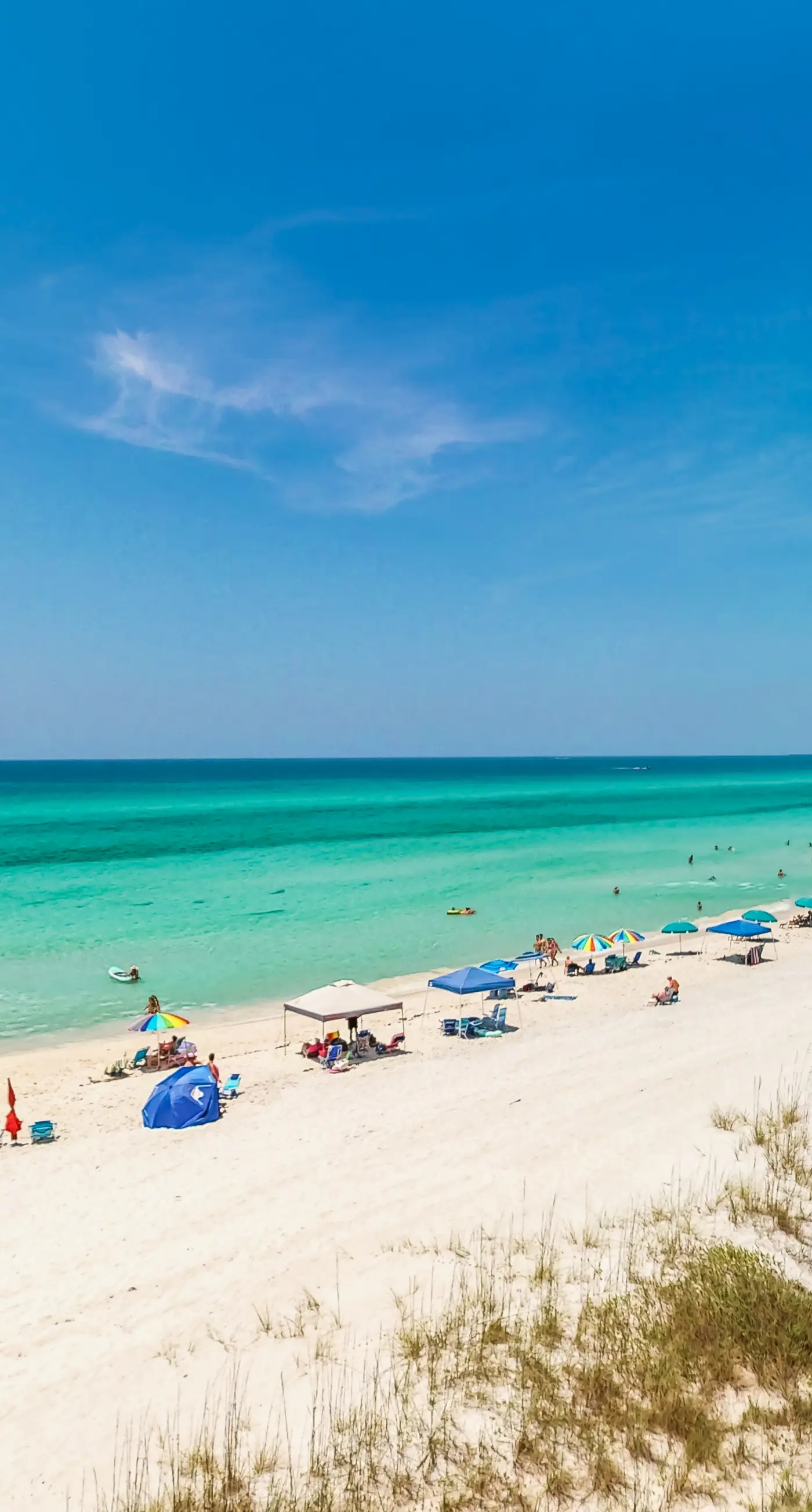 Beachfront condo with furnished balcony, pools, tennis courts, & hot tub