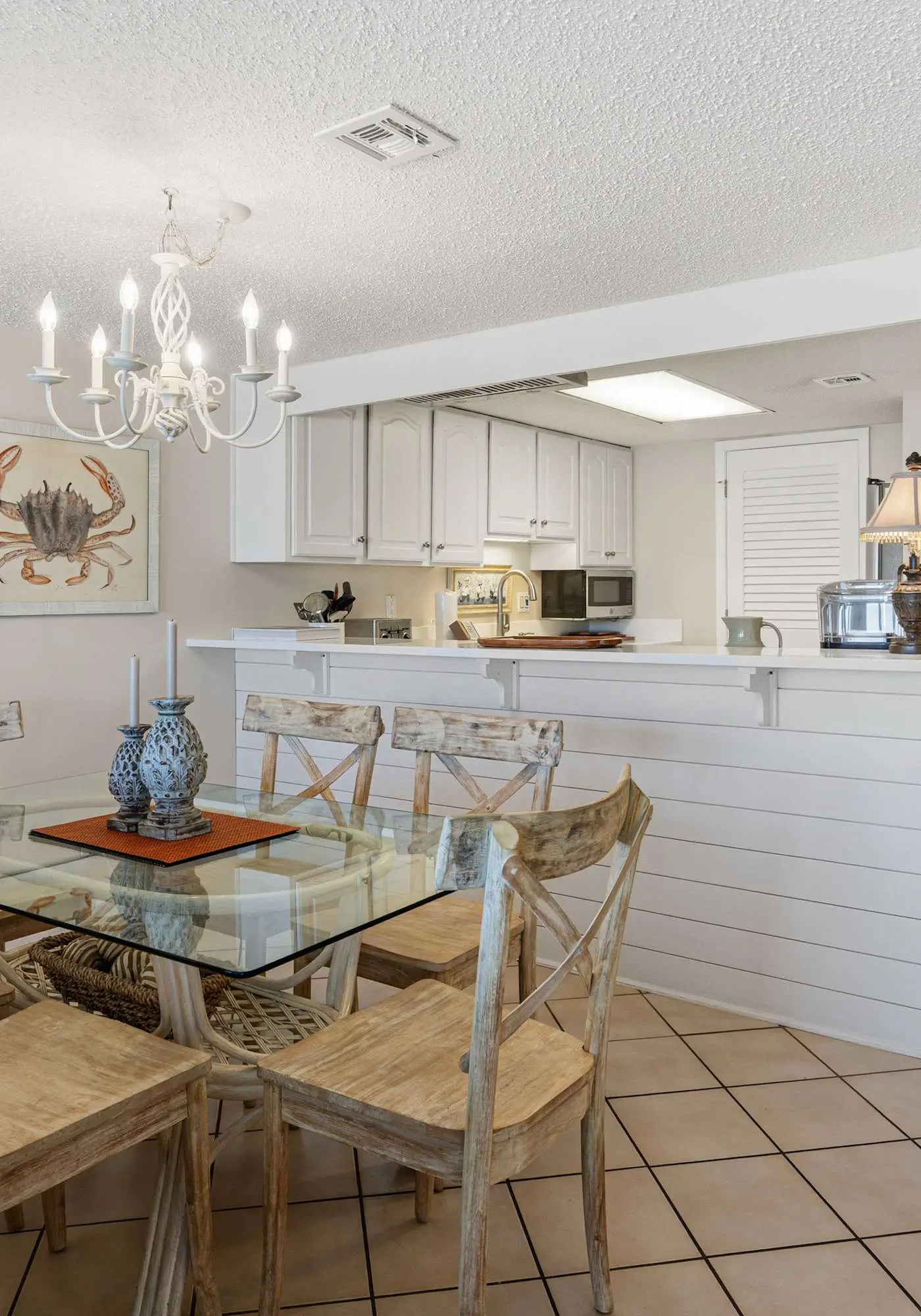 Beachfront condo with furnished balcony, pools, tennis courts, & hot tub
