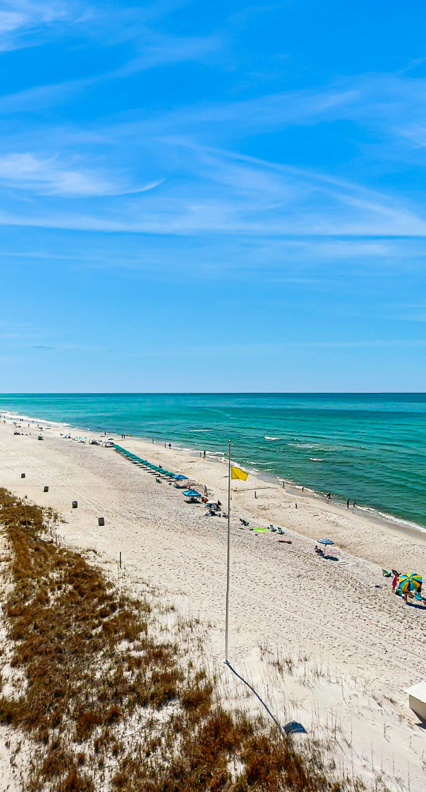 Gorgeous beachfront condo with plenty of space, shared pool & beach access