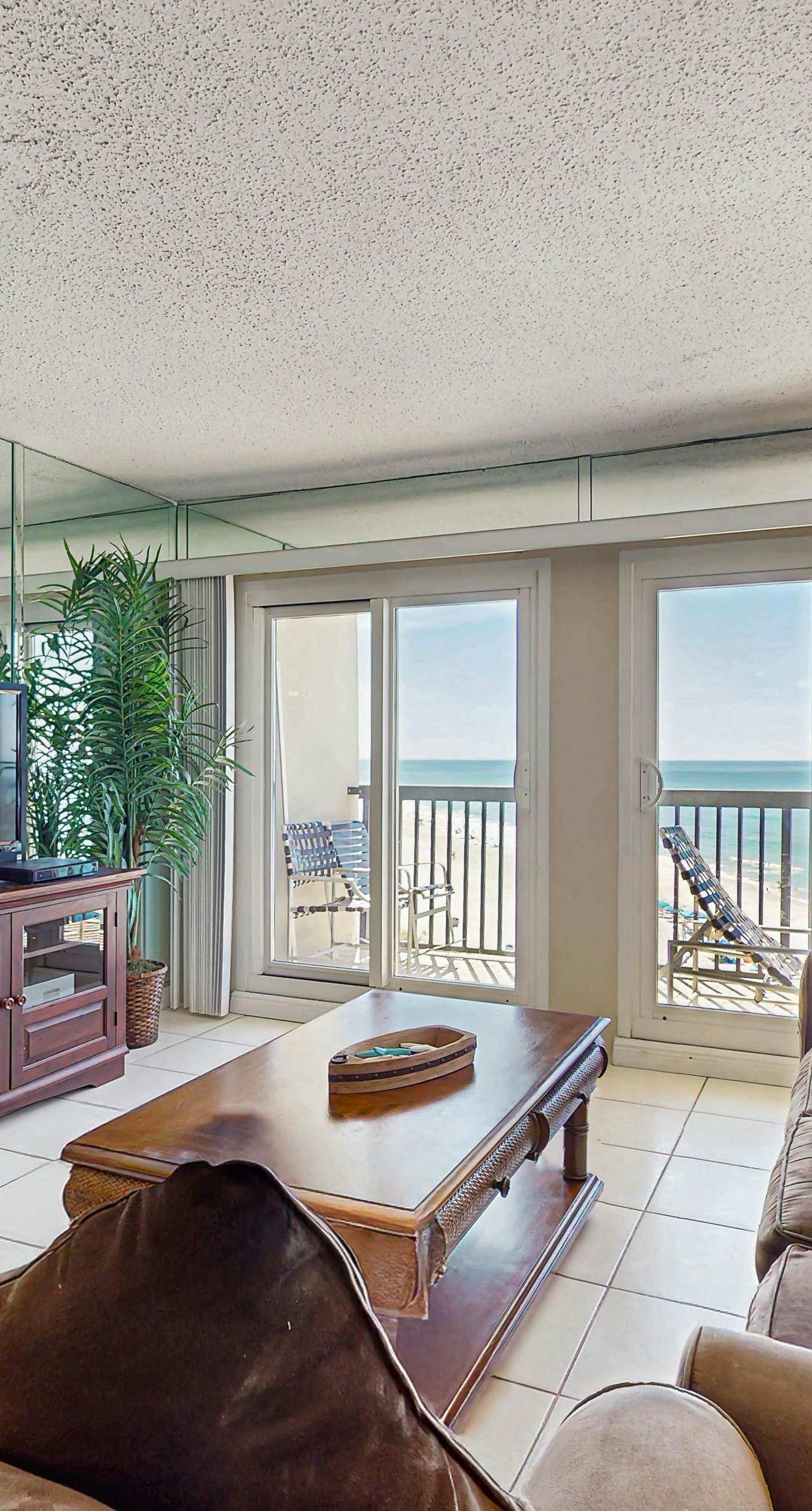 Gorgeous beachfront condo with plenty of space, shared pool & beach access