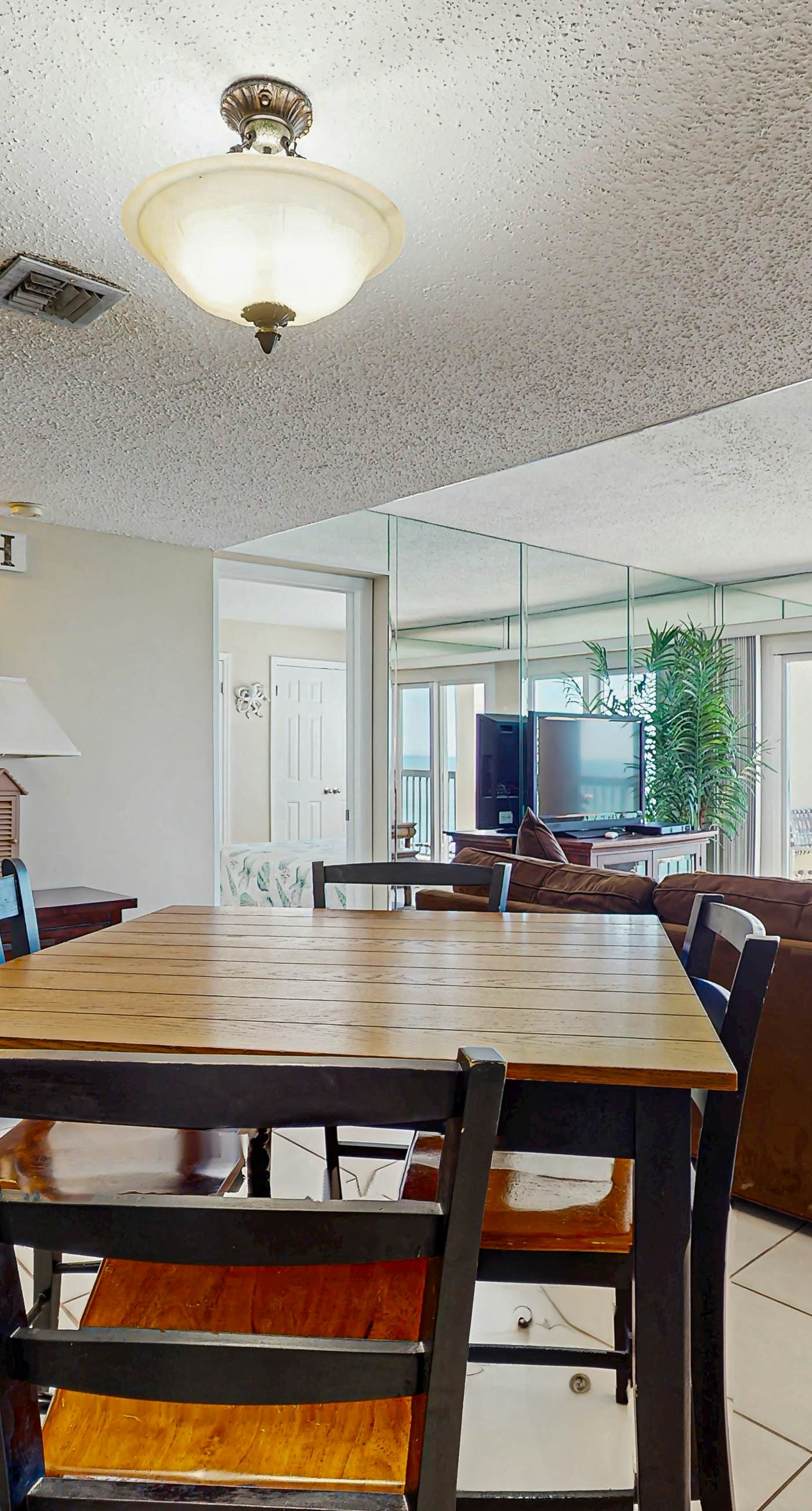 Gorgeous beachfront condo with plenty of space, shared pool & beach access