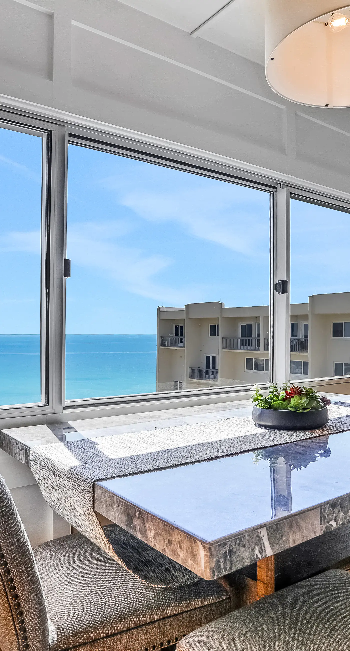 Beachfront penthouse with Gulf views, pools, beach chairs, saunas & tennis