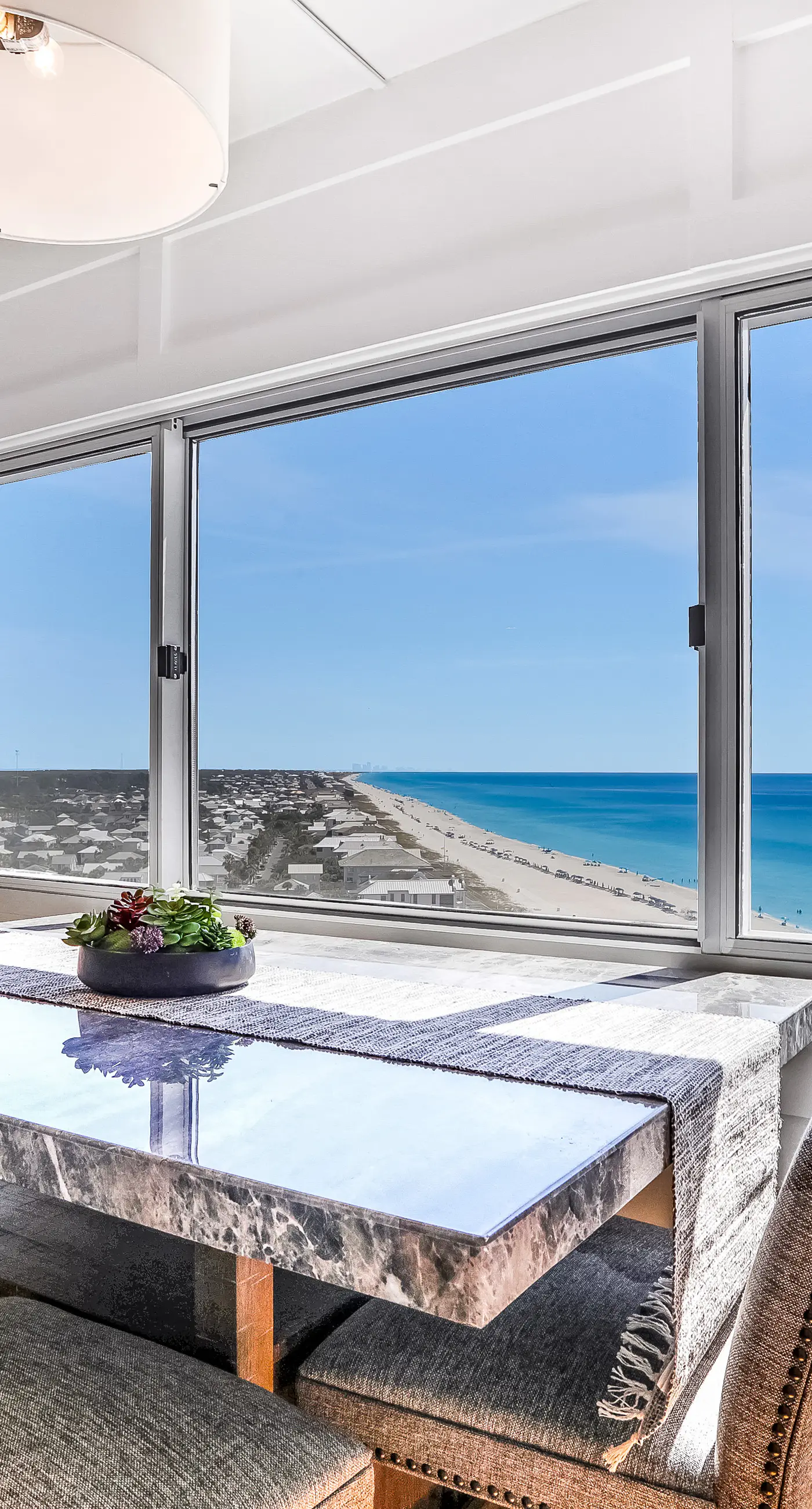 Beachfront penthouse with Gulf views, pools, beach chairs, saunas & tennis