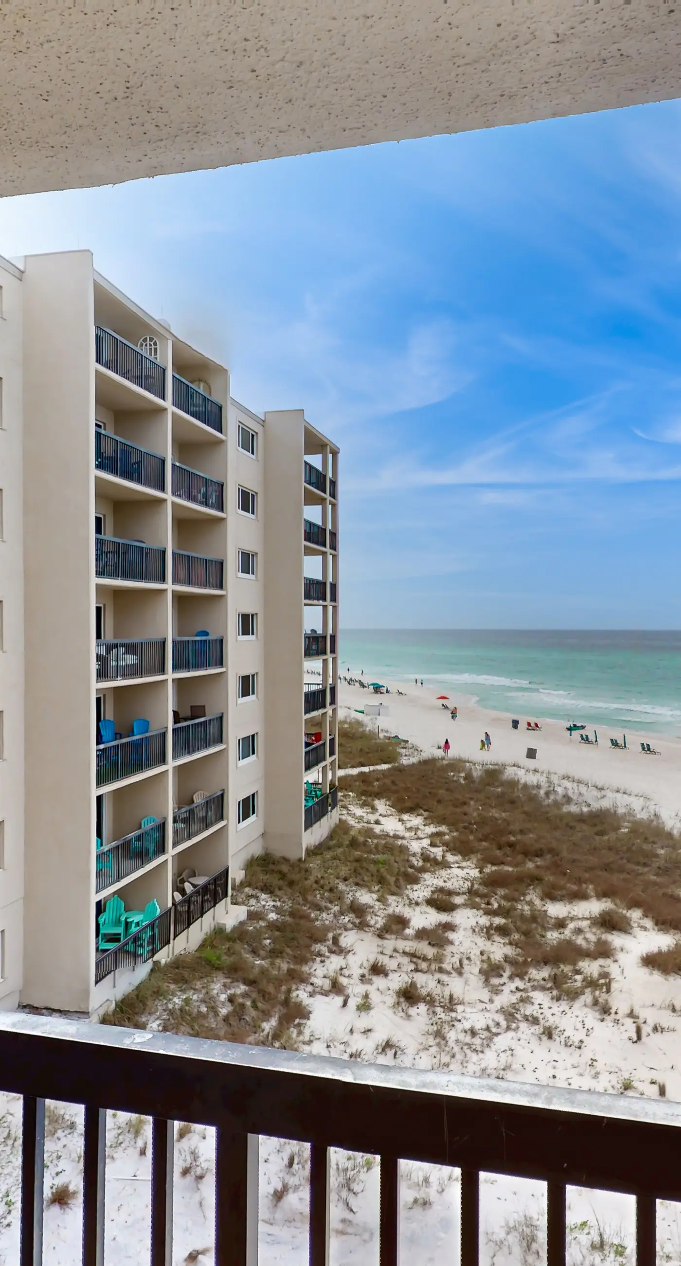 Cozy beachfront condo with private balcony, shared pool & beach access