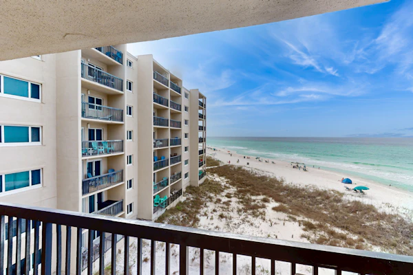 Cozy beachfront condo with private balcony, shared pool & beach access