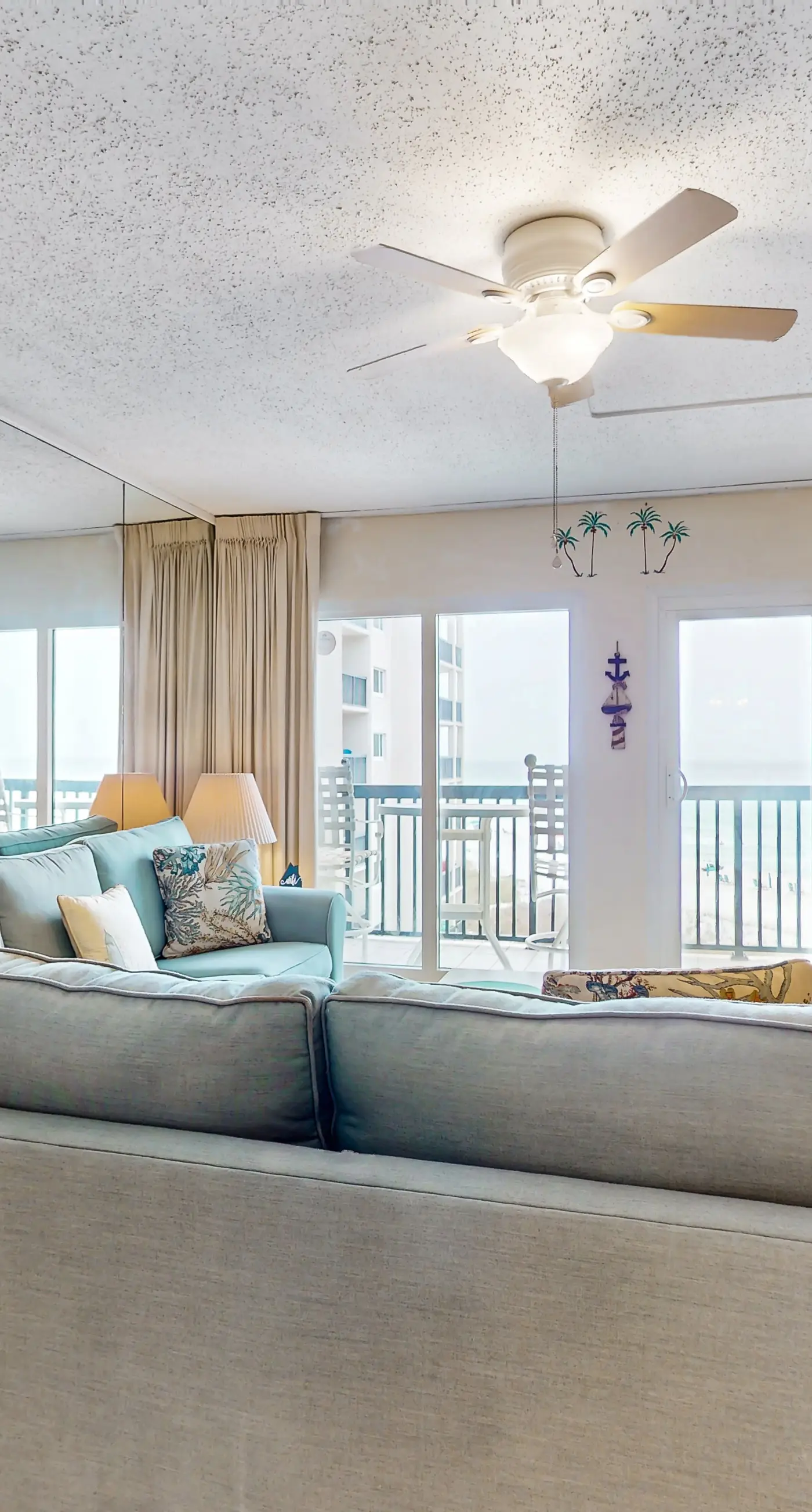 Cozy beachfront condo with private balcony, shared pool & beach access