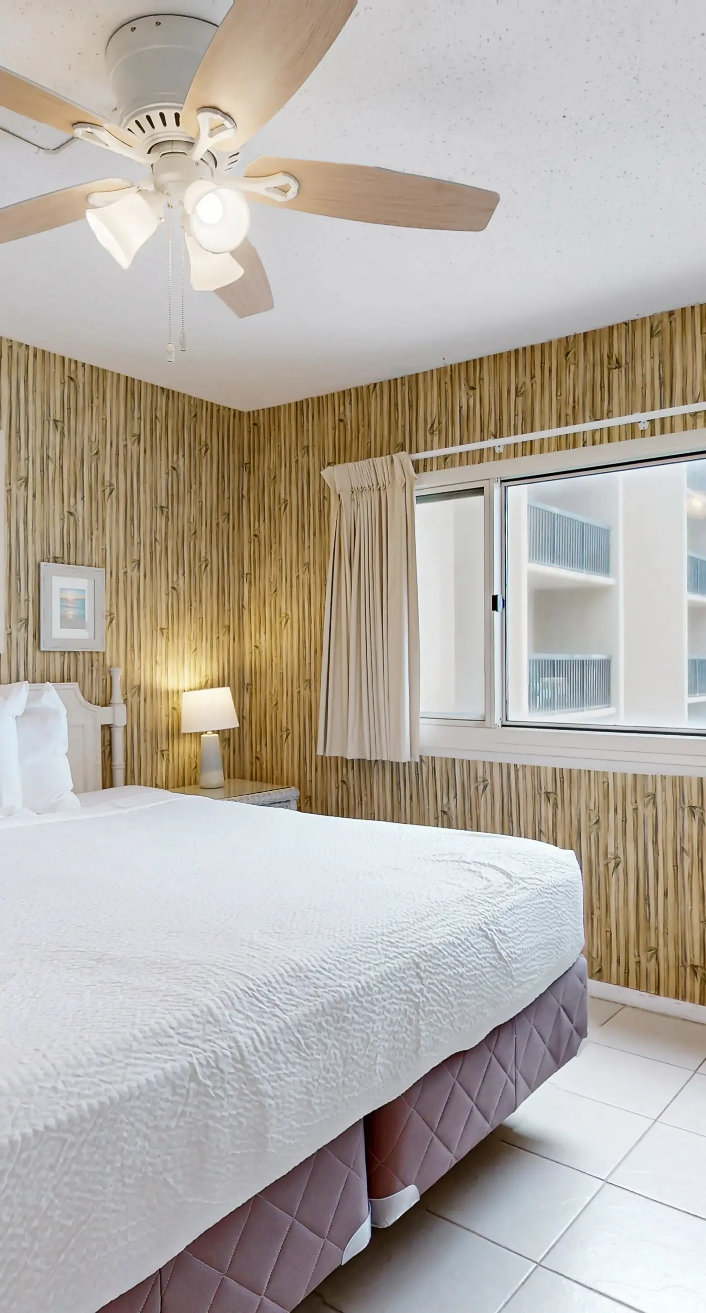 Cozy beachfront condo with private balcony, shared pool & beach access
