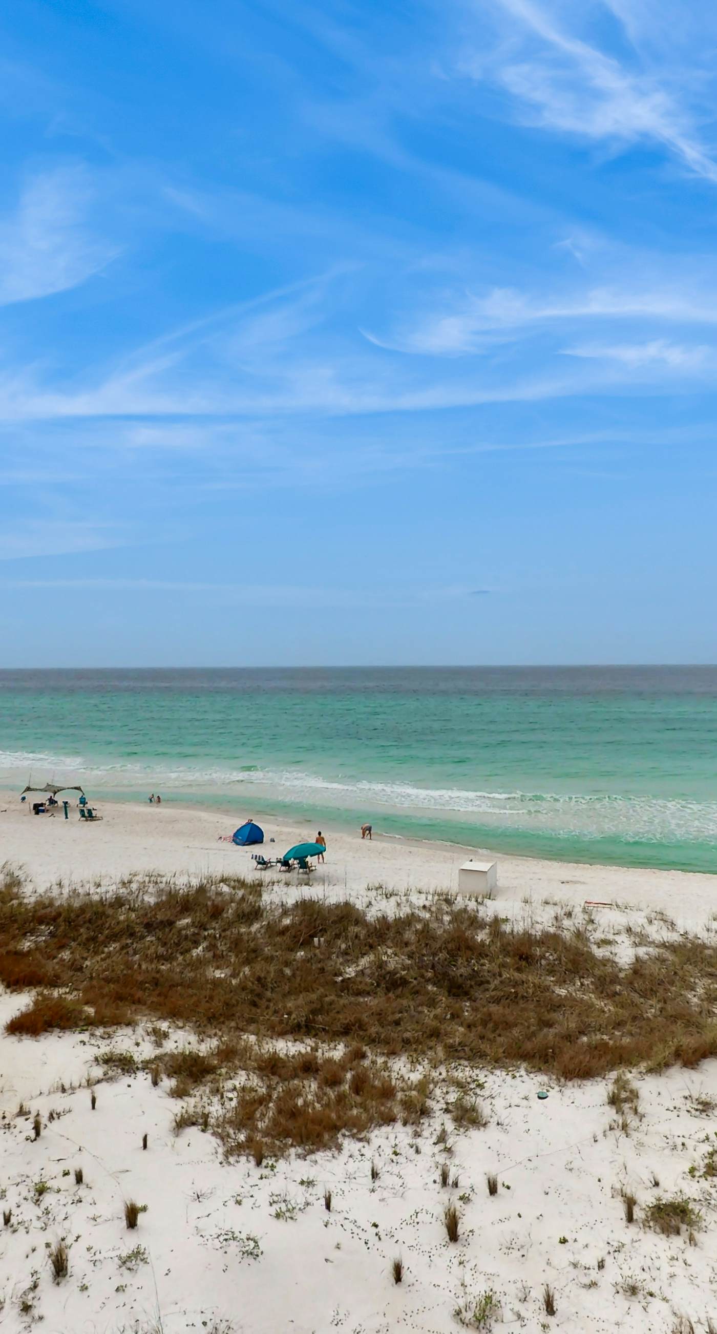 Cozy beachfront condo with private balcony, shared pool & beach access
