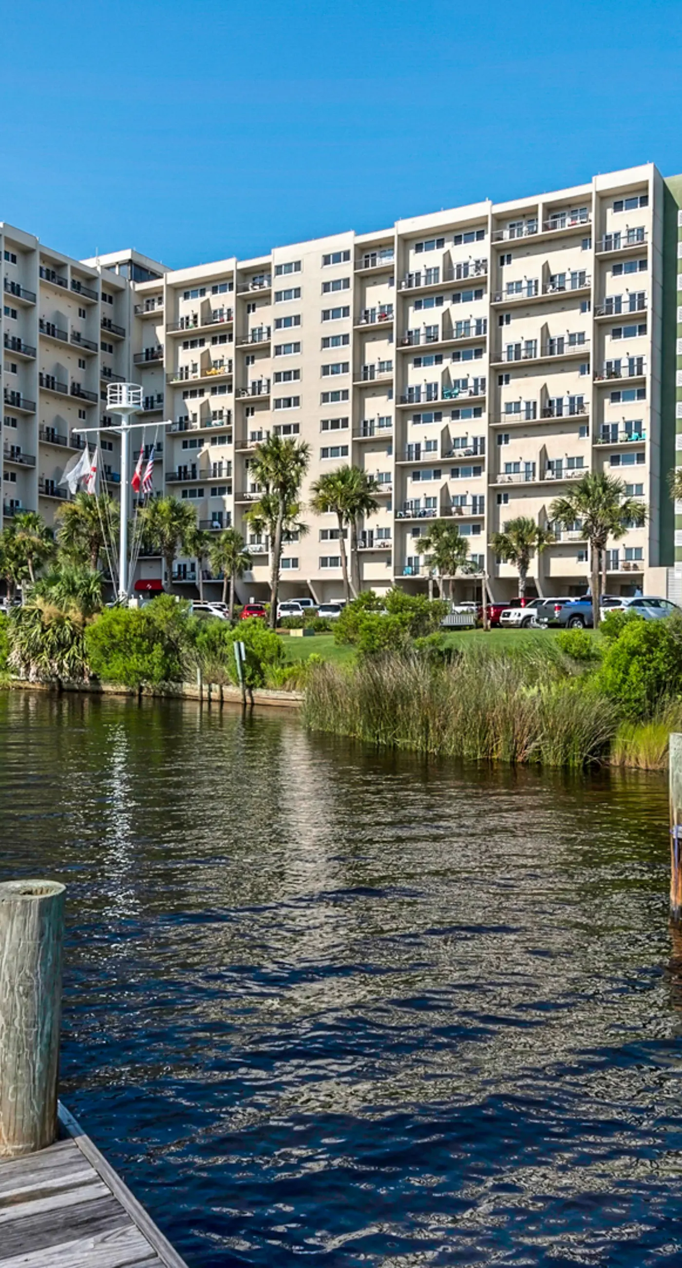 Cozy beachfront condo with private balcony, shared pool & beach access