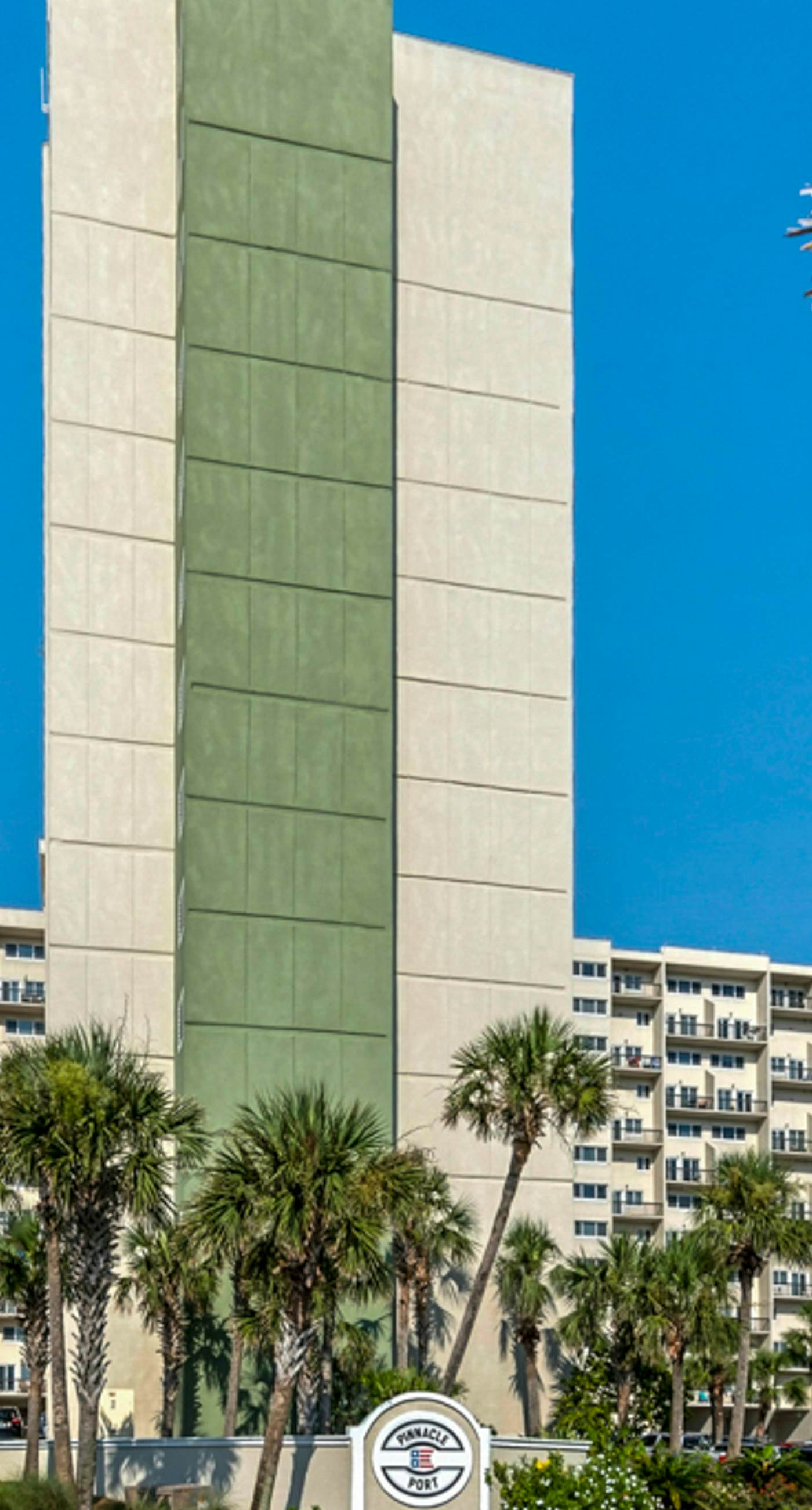 Beautiful Pinnacle Port condo with pools & basketball court right next to beach